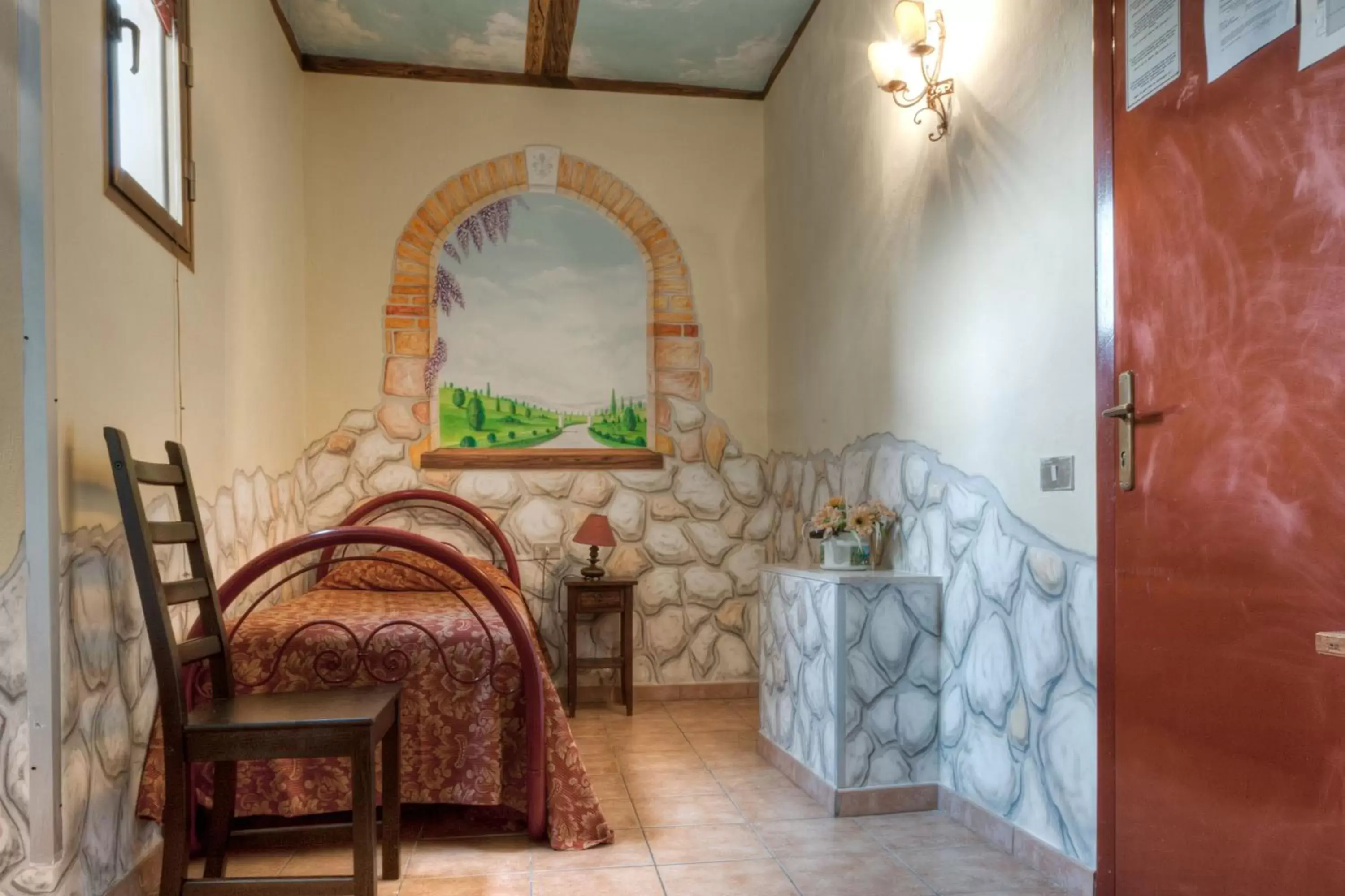 Bed, Seating Area in Hotel Masaccio