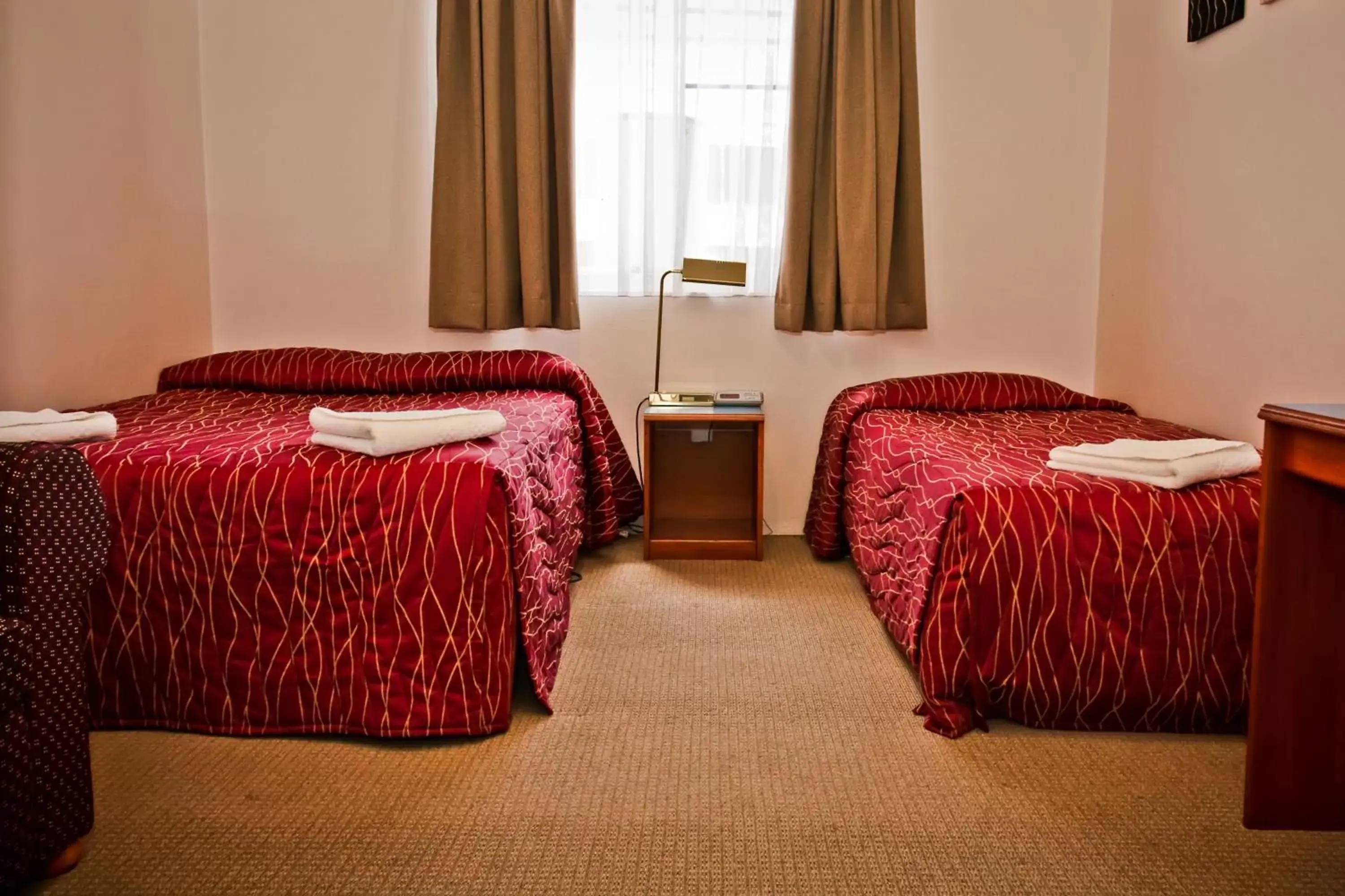 Bed in Abbotsleigh Motor Inn