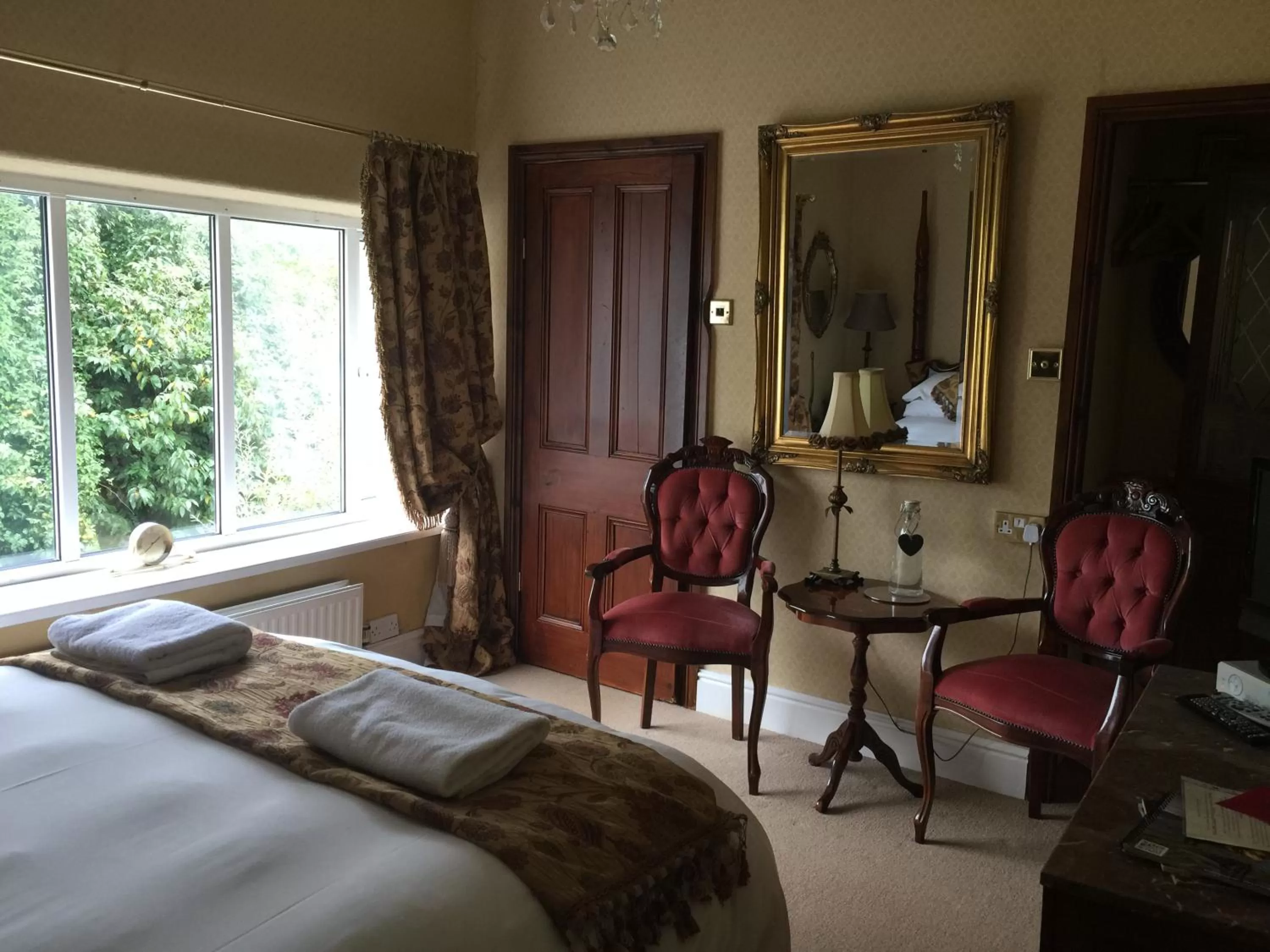 Seating area, Bed in Glyn Isa Country House luxury self catering accommodation