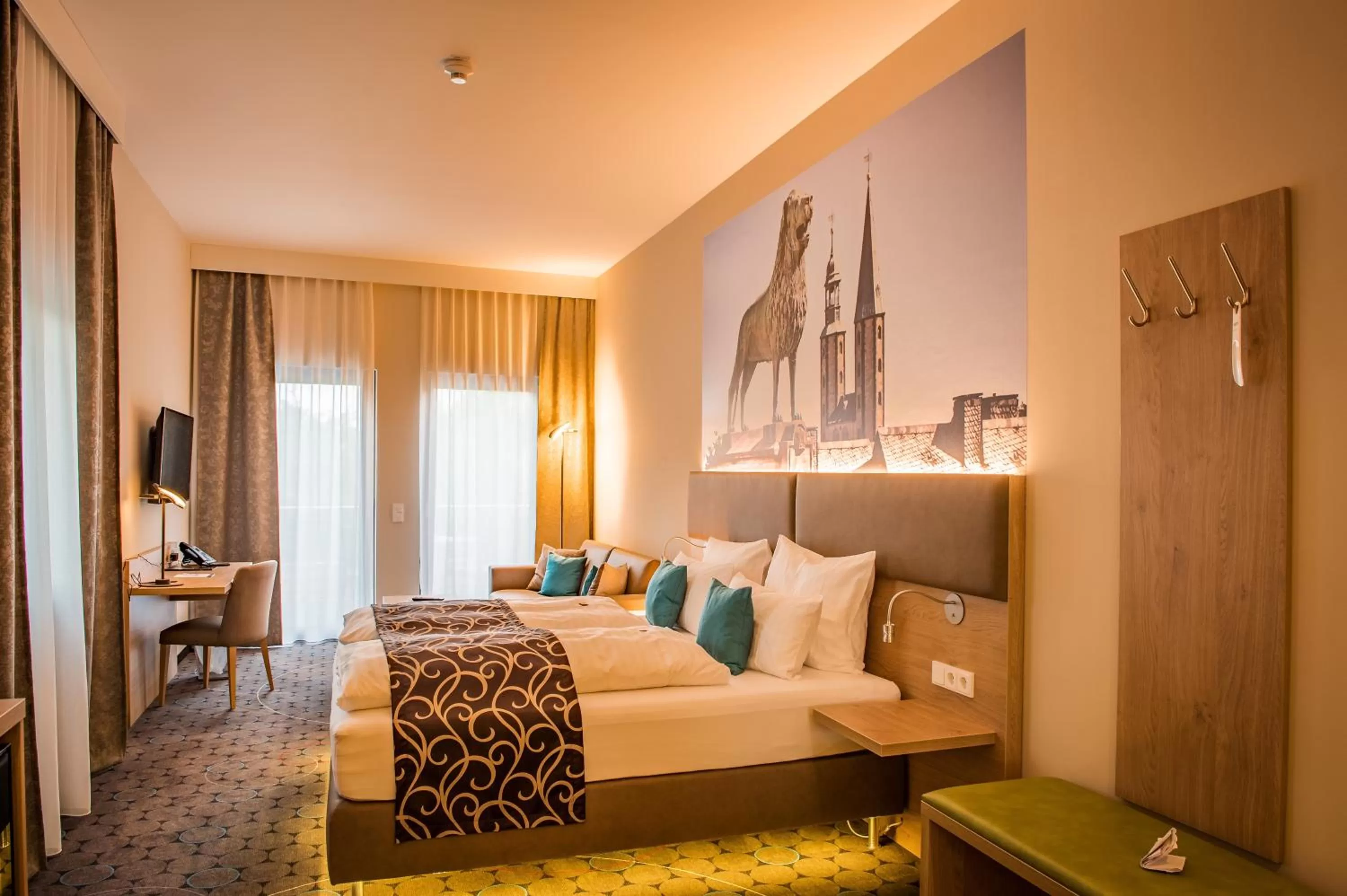 Photo of the whole room, Bed in AKZENT Hotel Villa Saxer