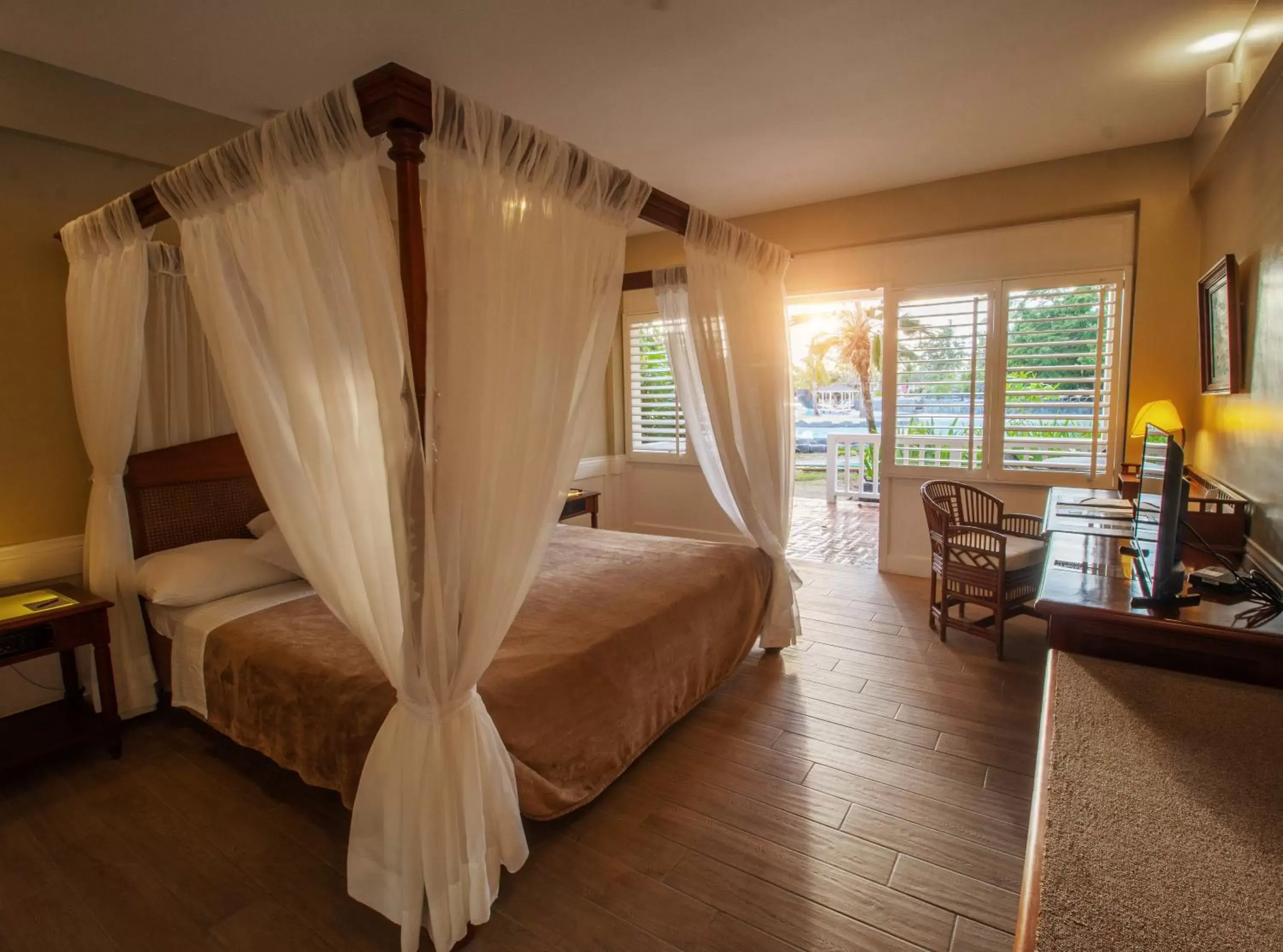 Bed in Plantation Bay Resort and Spa