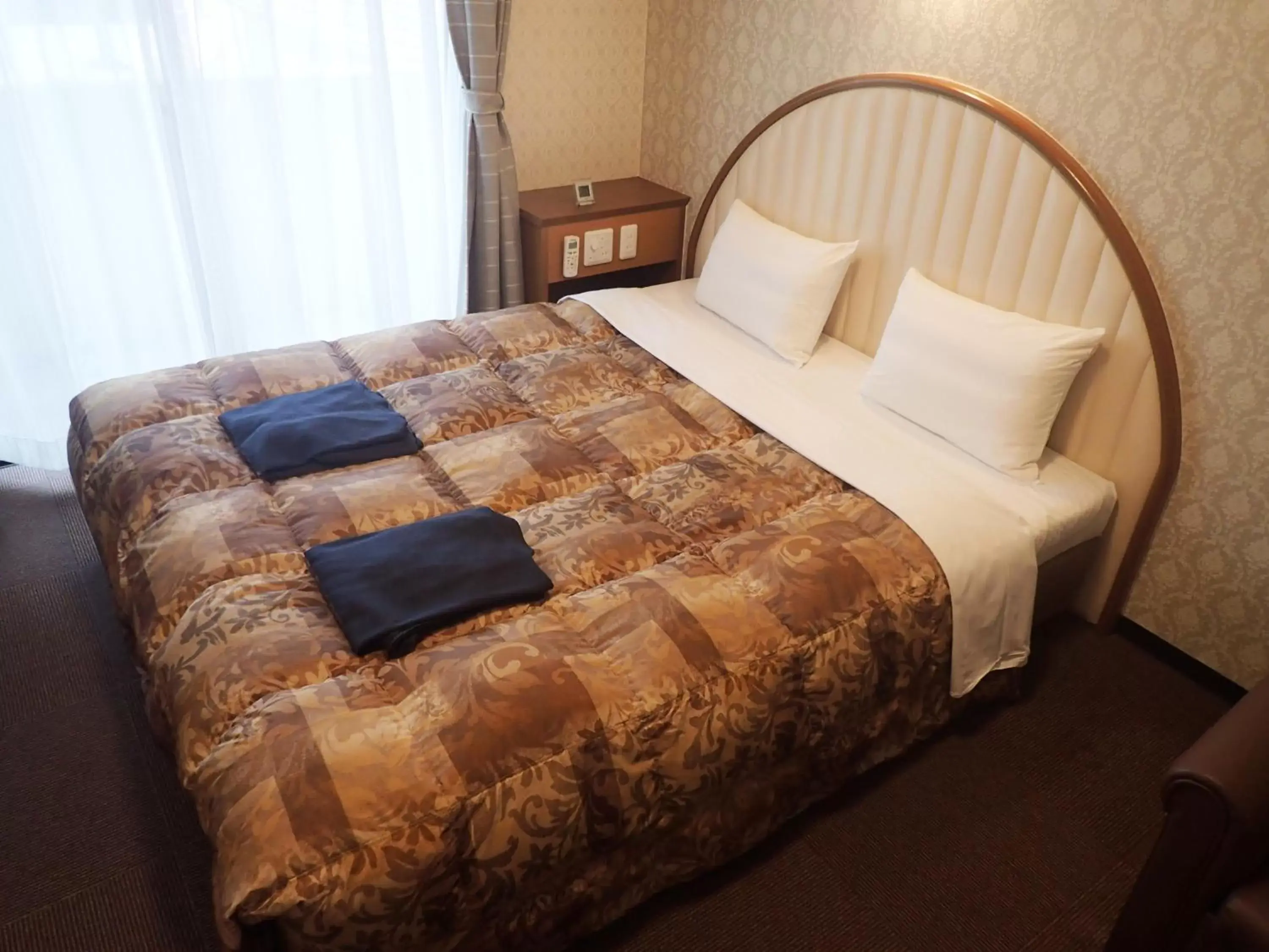 Bed in Castle Inn Komaki