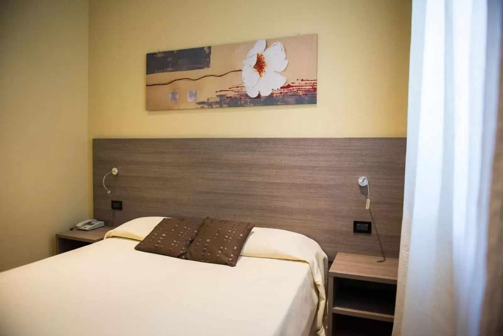 Bed in Albergo Grappolo D'oro