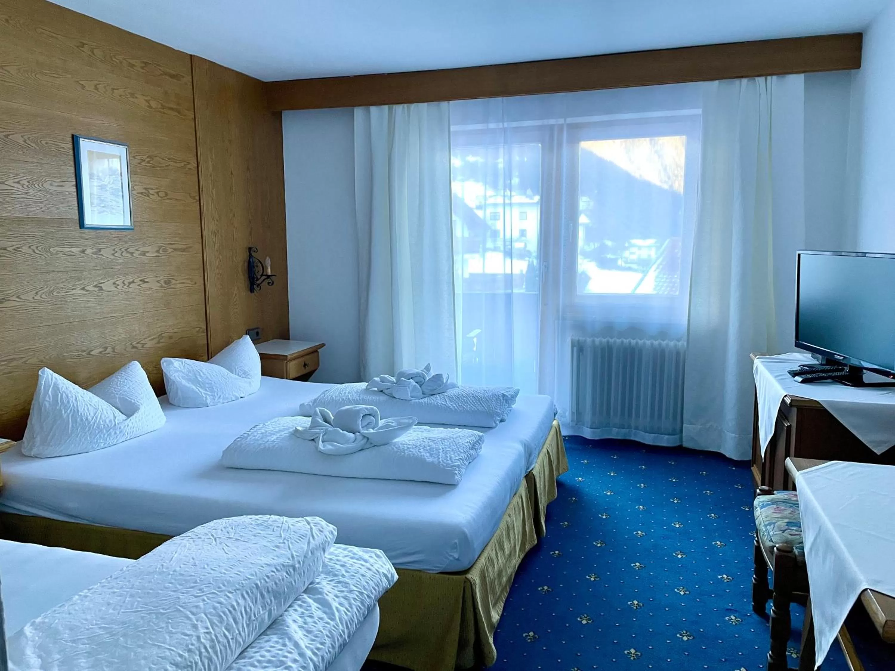 Bed in Hotel Marienhof- Erstes Motorradhotel in Fliess!