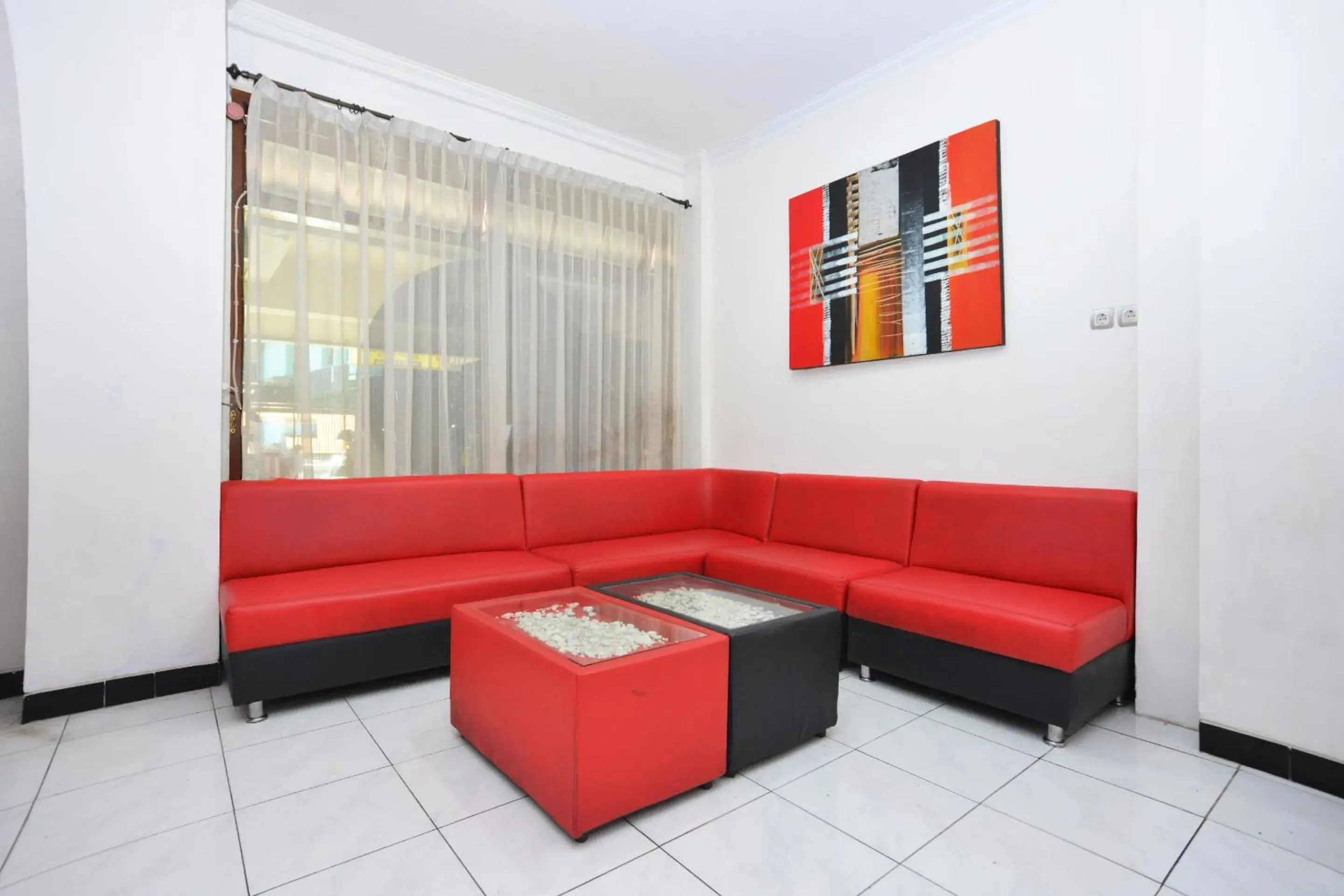 Communal lounge/ TV room, Seating Area in OYO 745 Griya Jasmine Syariah