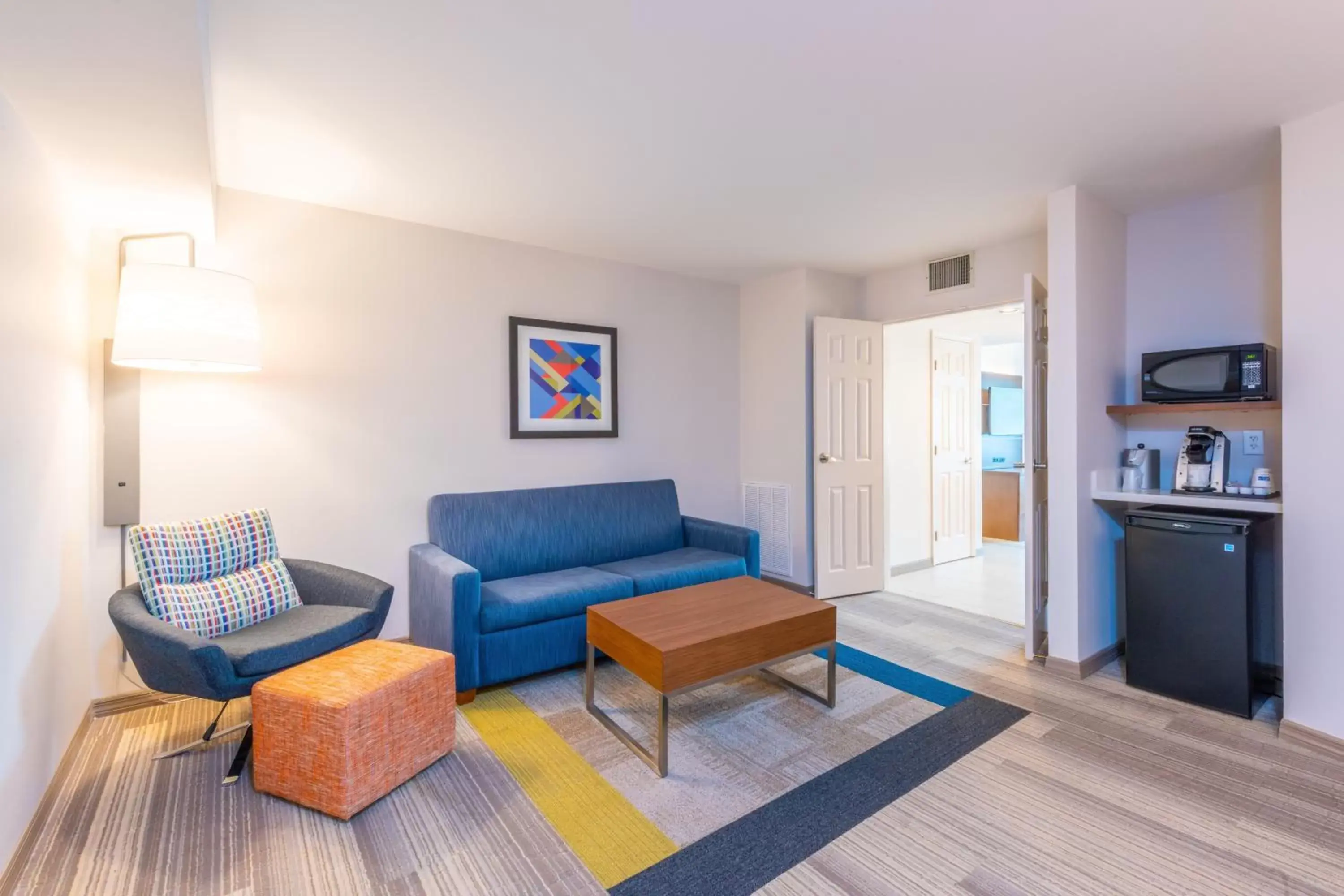 Photo of the whole room, Seating Area in Holiday Inn Express Hotel & Suites Bradenton West, an IHG Hotel