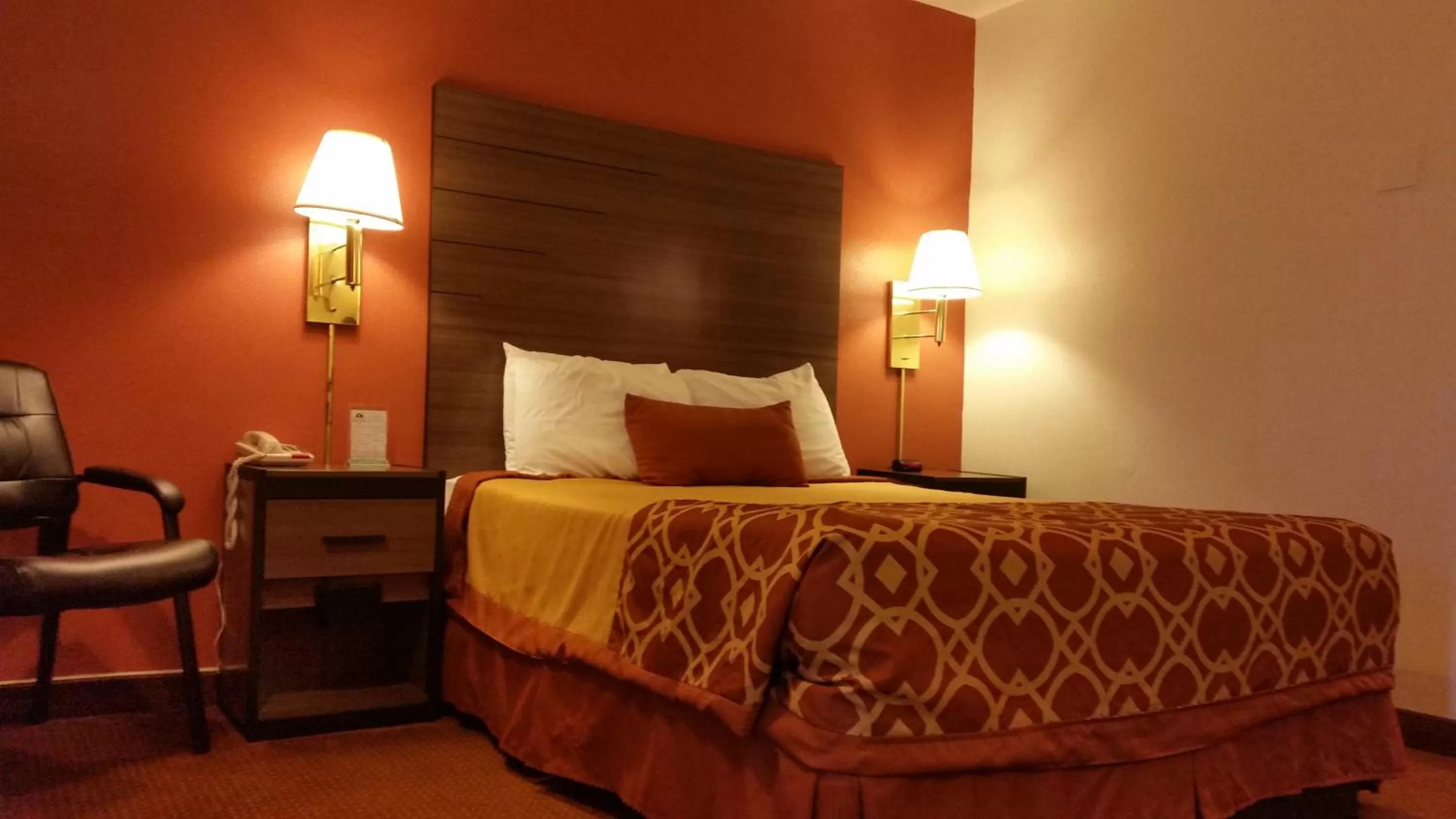 Bed in American Inn Of Liberal