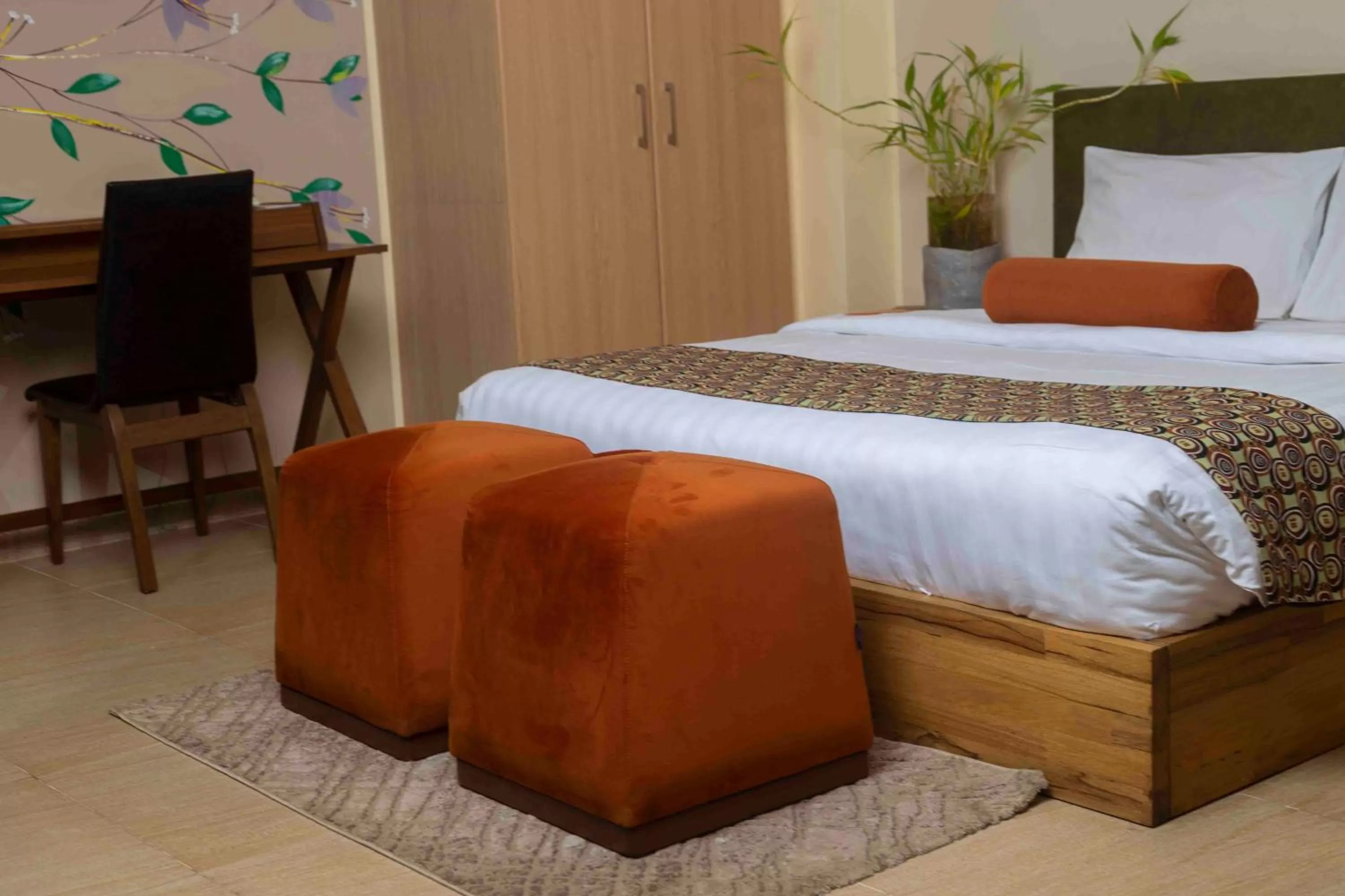 Bed in Roots Hotel Apartment