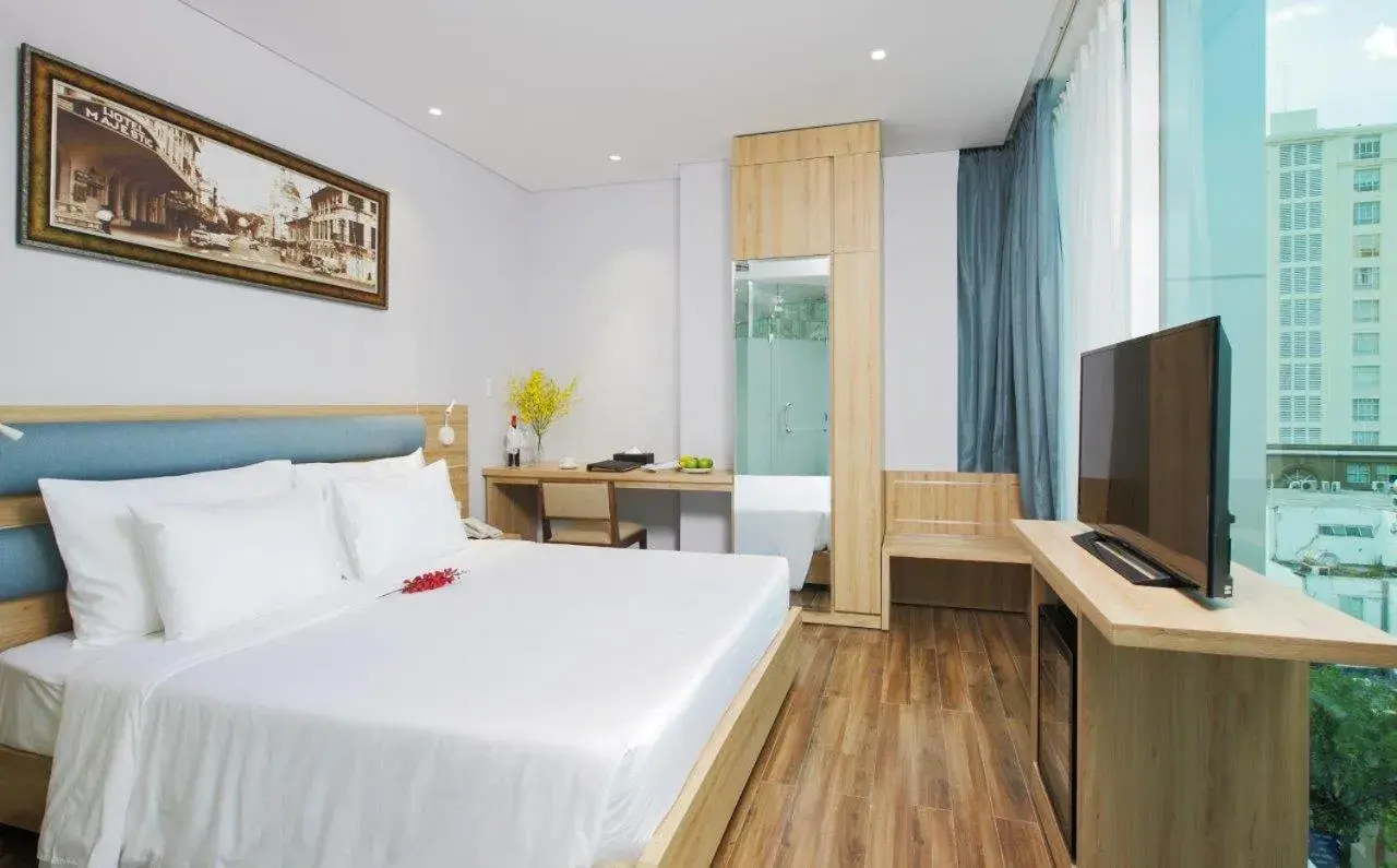 Bedroom, Bed in RAMADA ENCORE BY WYNDHAM SAIGON D1 - Formerly M Boutique Hotel Saigon