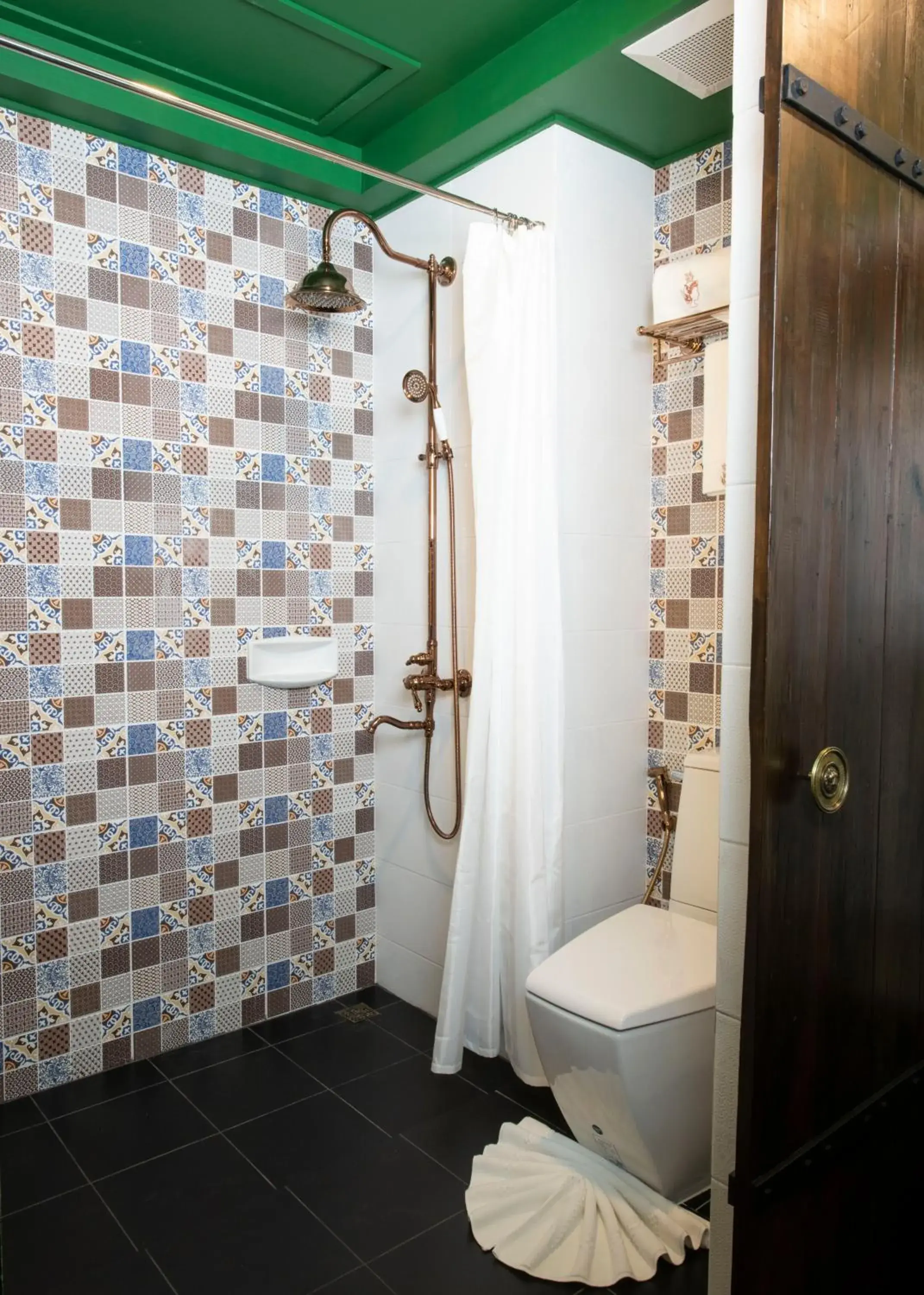 Bathroom in Dhevi Bangkok Hotel  (SHA Extra Plus)