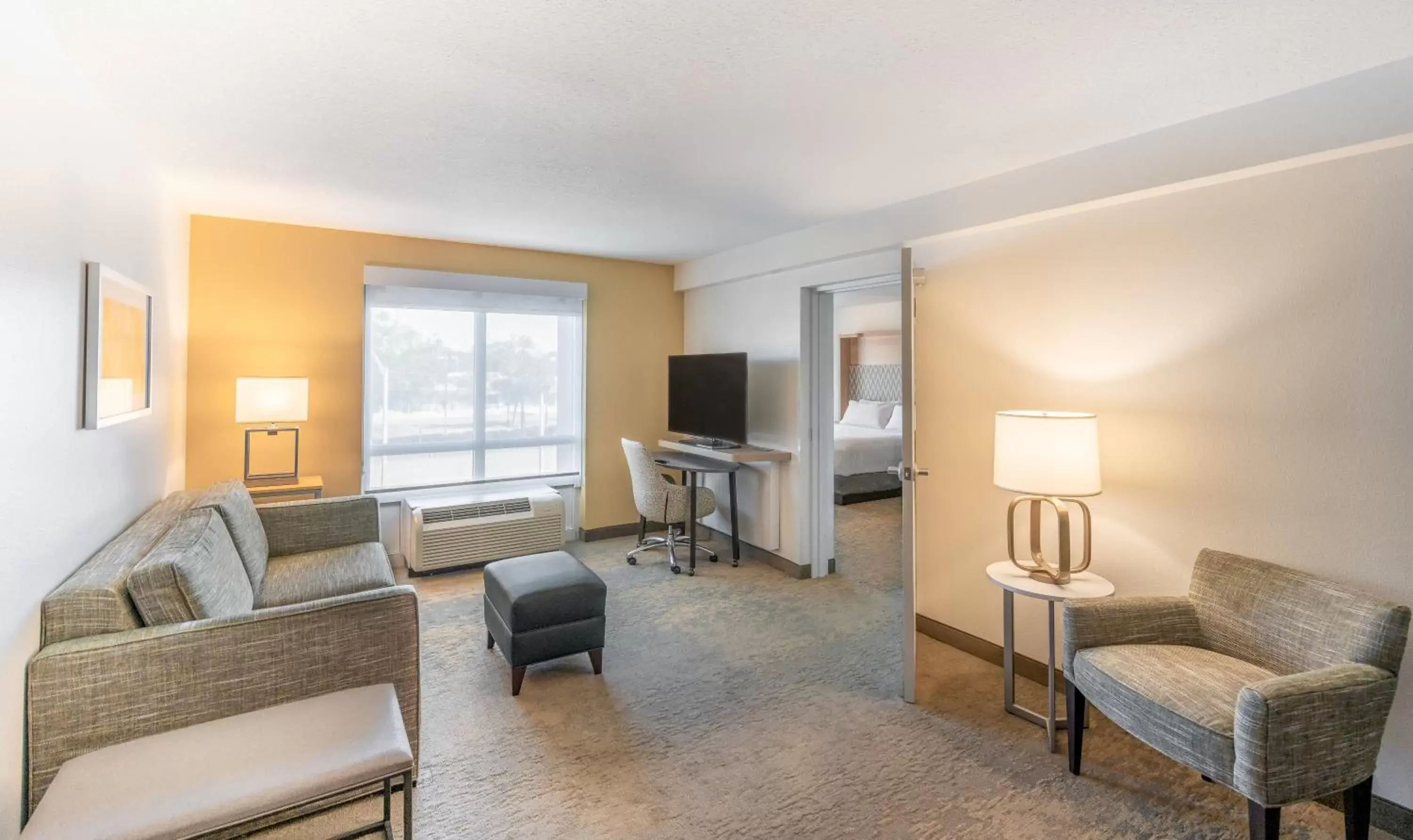 Photo of the whole room, Seating Area in Holiday Inn Hotel & Suites - Orange Park - Wells Rd.