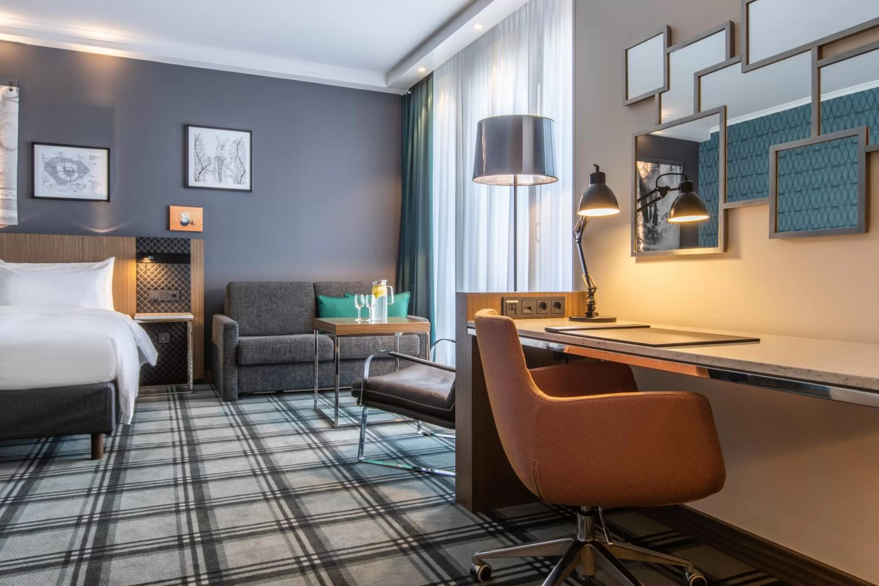 Seating area, Bed in Radisson Blu Hotel Hannover