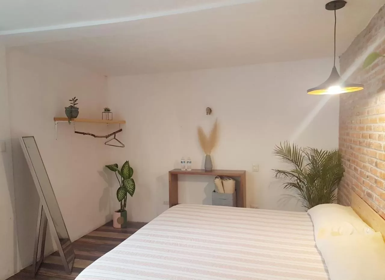 Bed in Hostal Hoja Santa