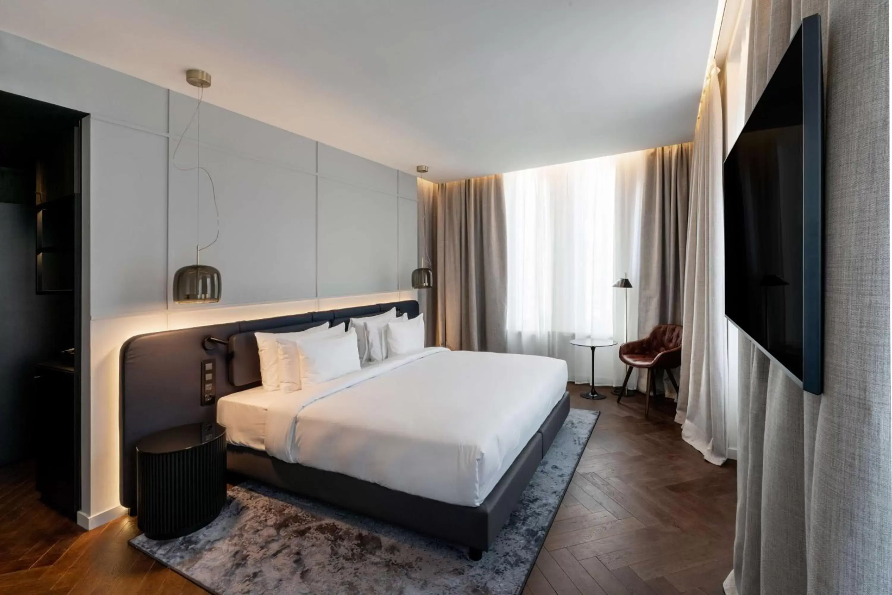 Photo of the whole room, Bed in Radisson Collection Hotel, Santa Sofia Milan