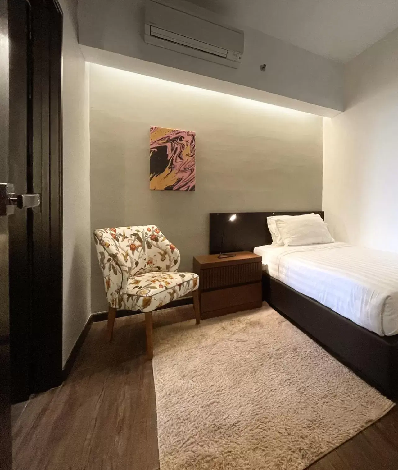 Bed in Tropics Eight Suites