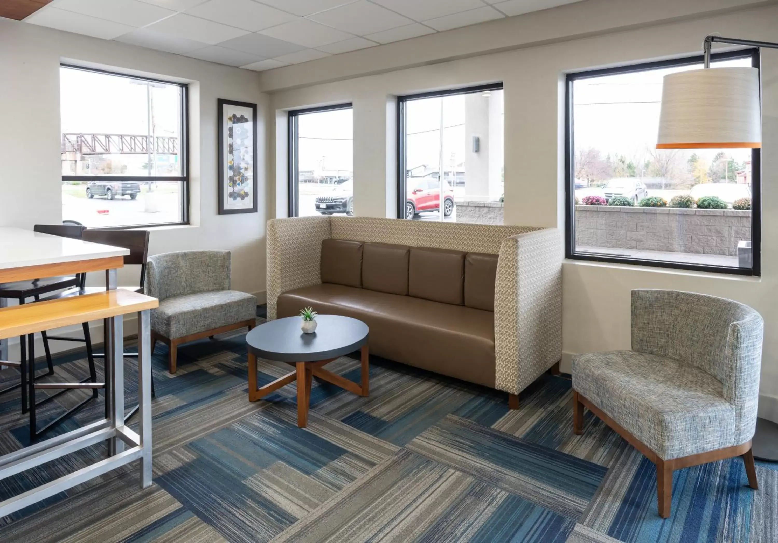 Property building, Seating Area in Holiday Inn Express Rochester - Greece, an IHG Hotel