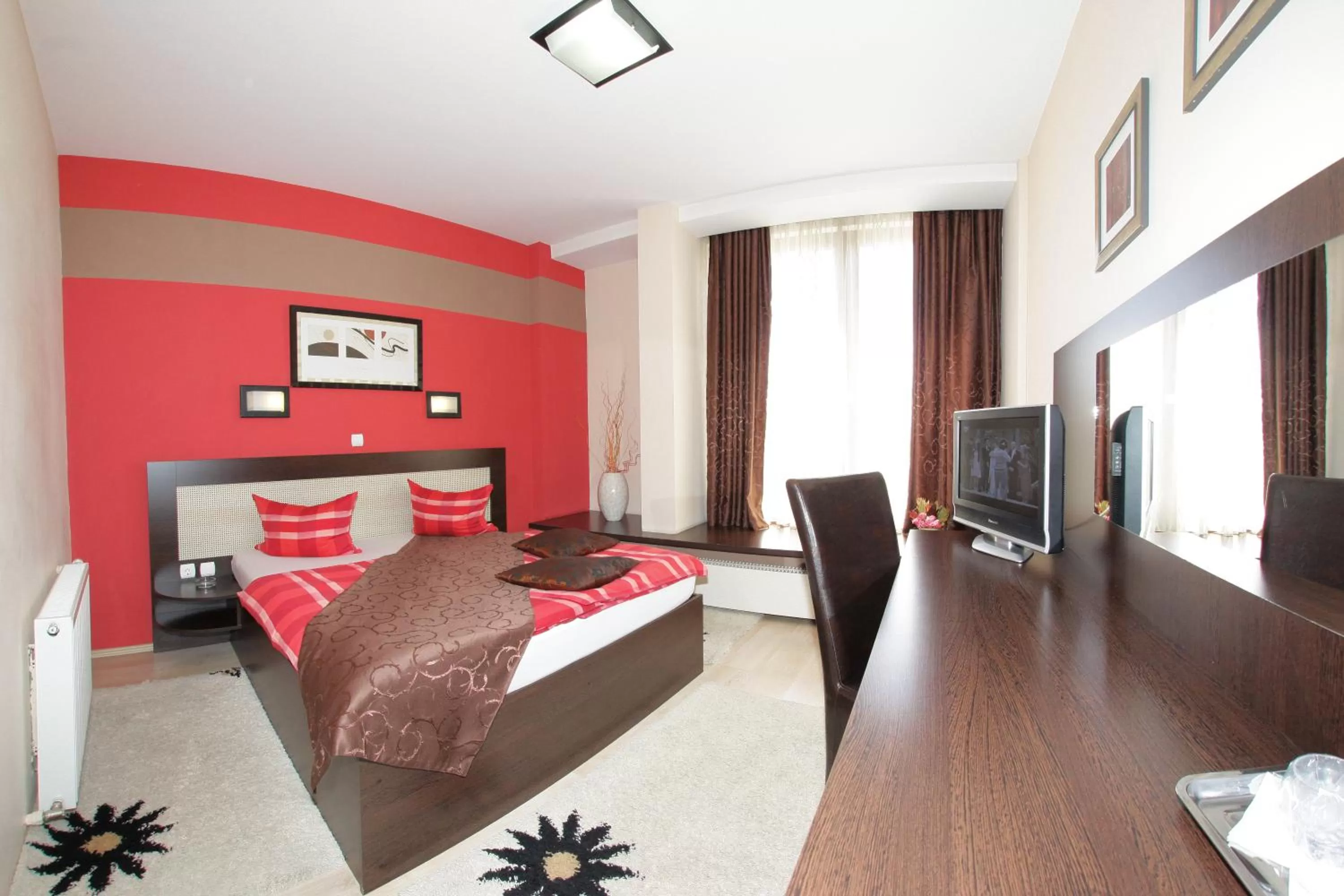 Photo of the whole room, Seating Area in Hotel Sheriff