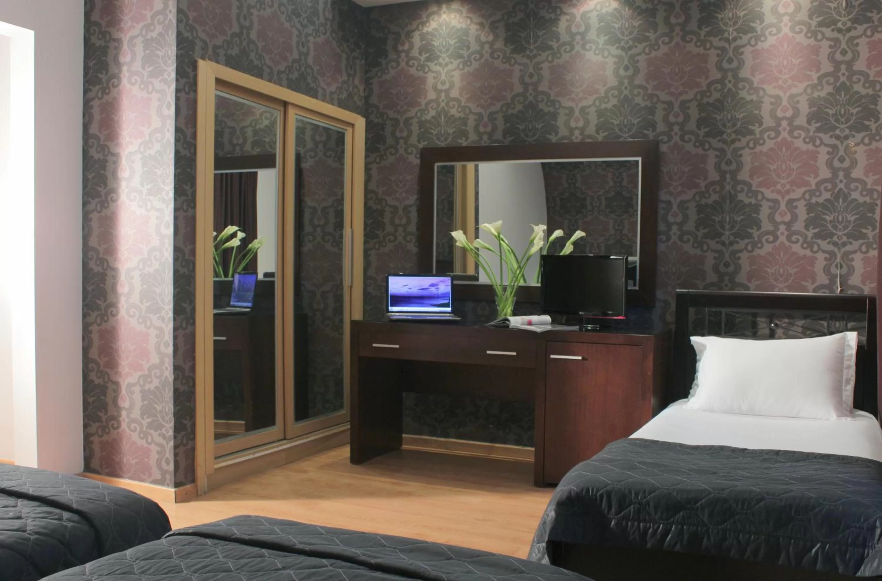 Bed in Galaxy Art Hotel