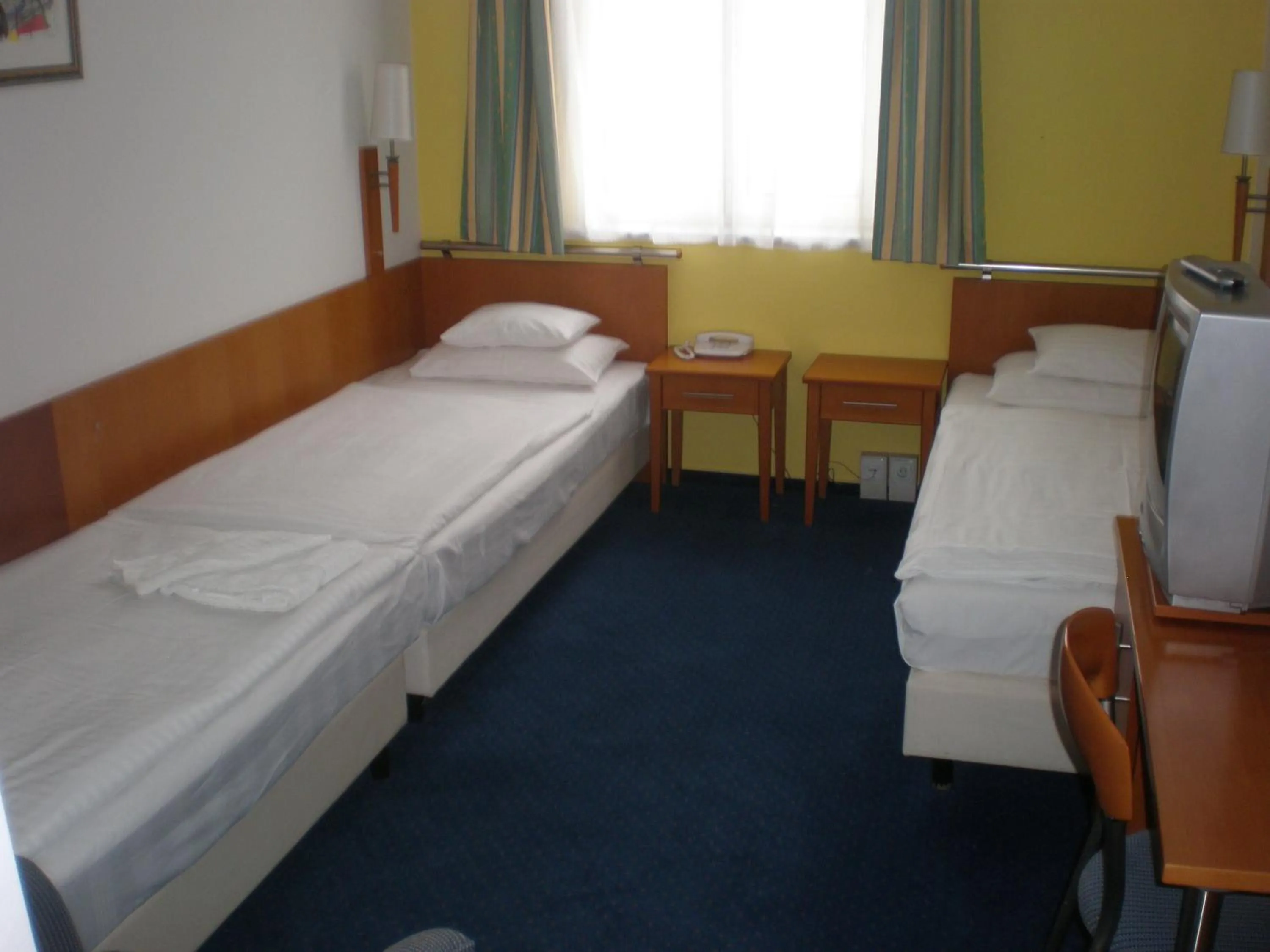 Bed in Hotel Veritas