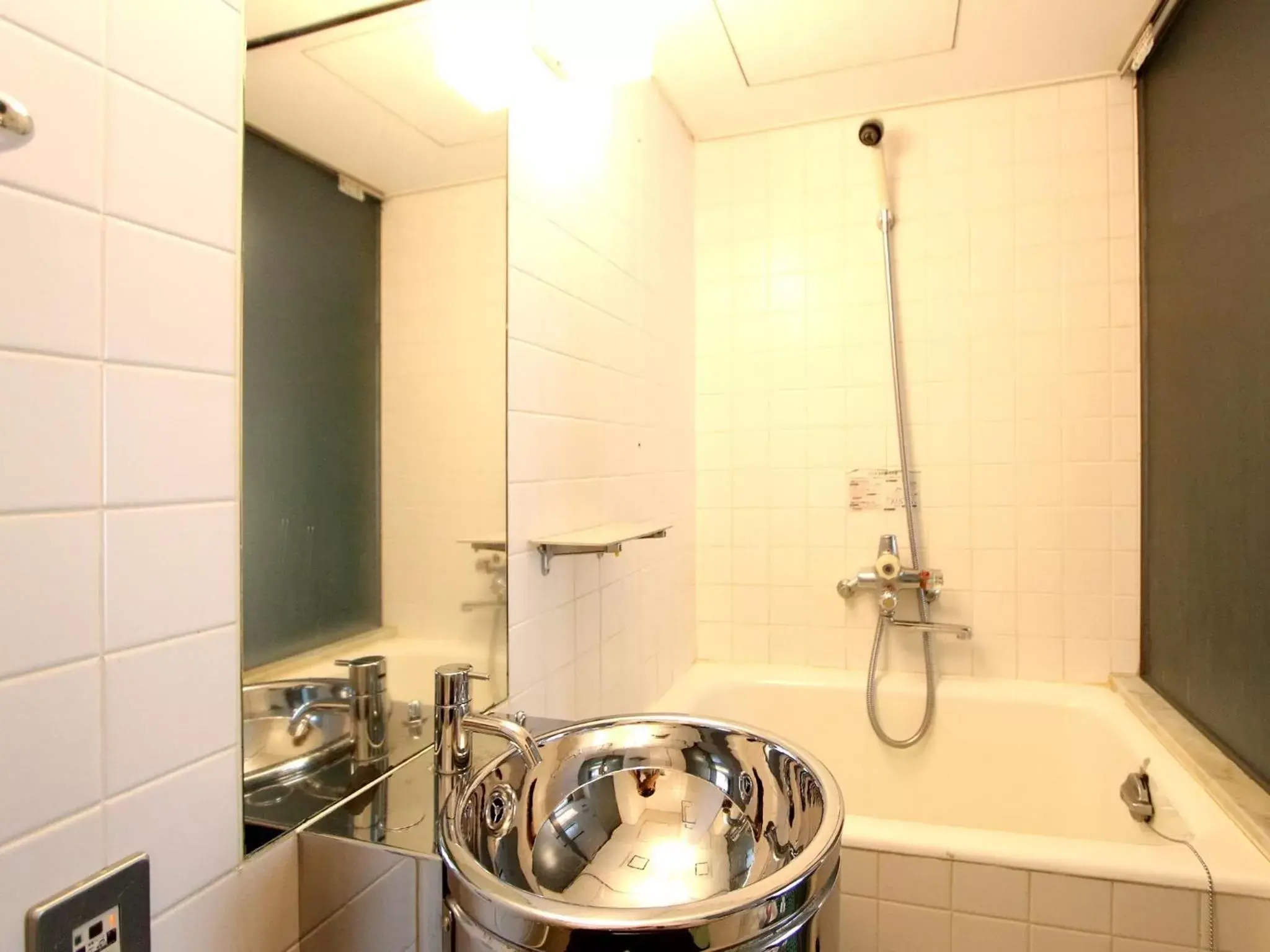 Bathroom in HOTEL LiVEMAX BUDGET Yumoto