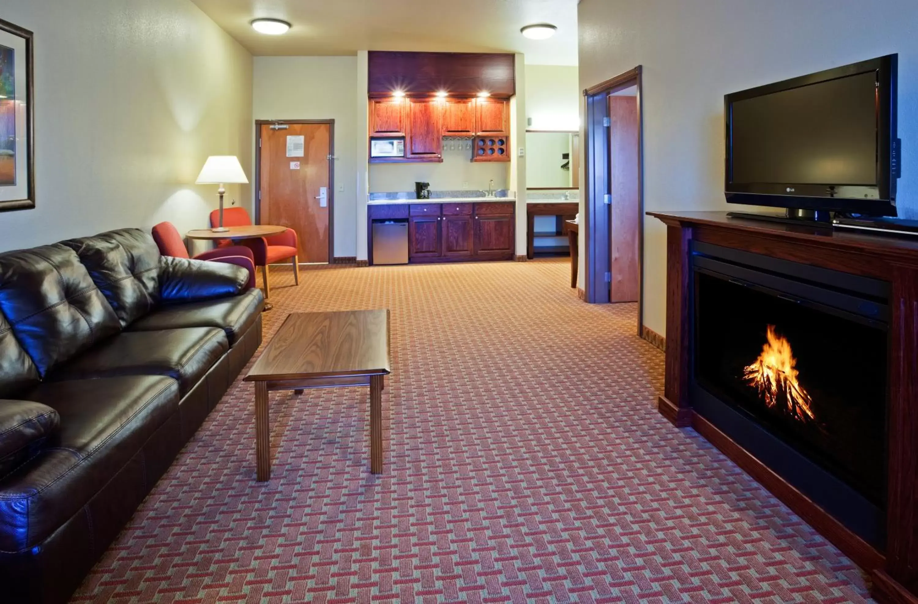 Living room, Seating Area in Baymont Inn & Suites by Wyndham Sturgis