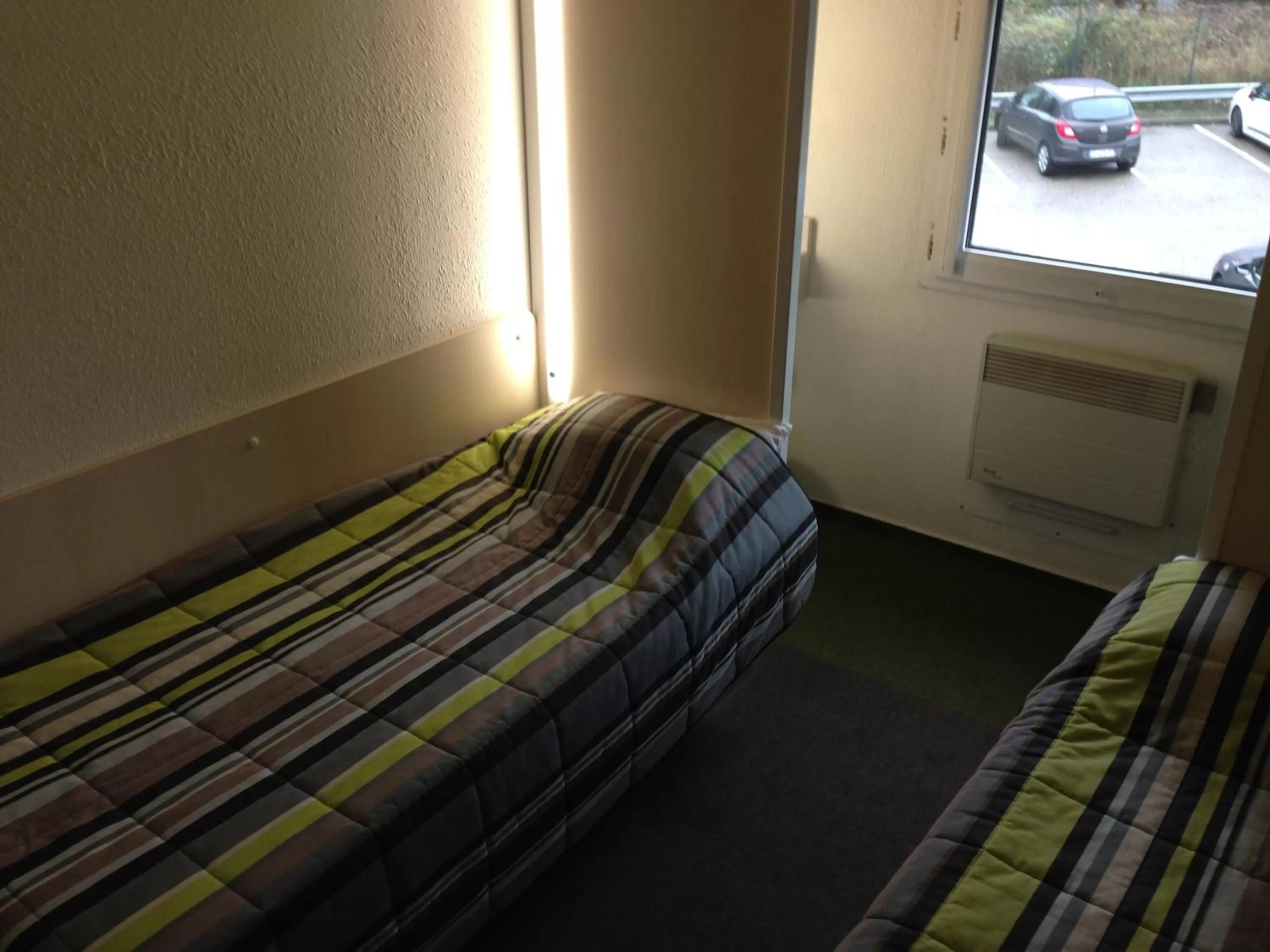 Bedroom, Bed in hotelF1 Saint Etienne Est La Grand Croix