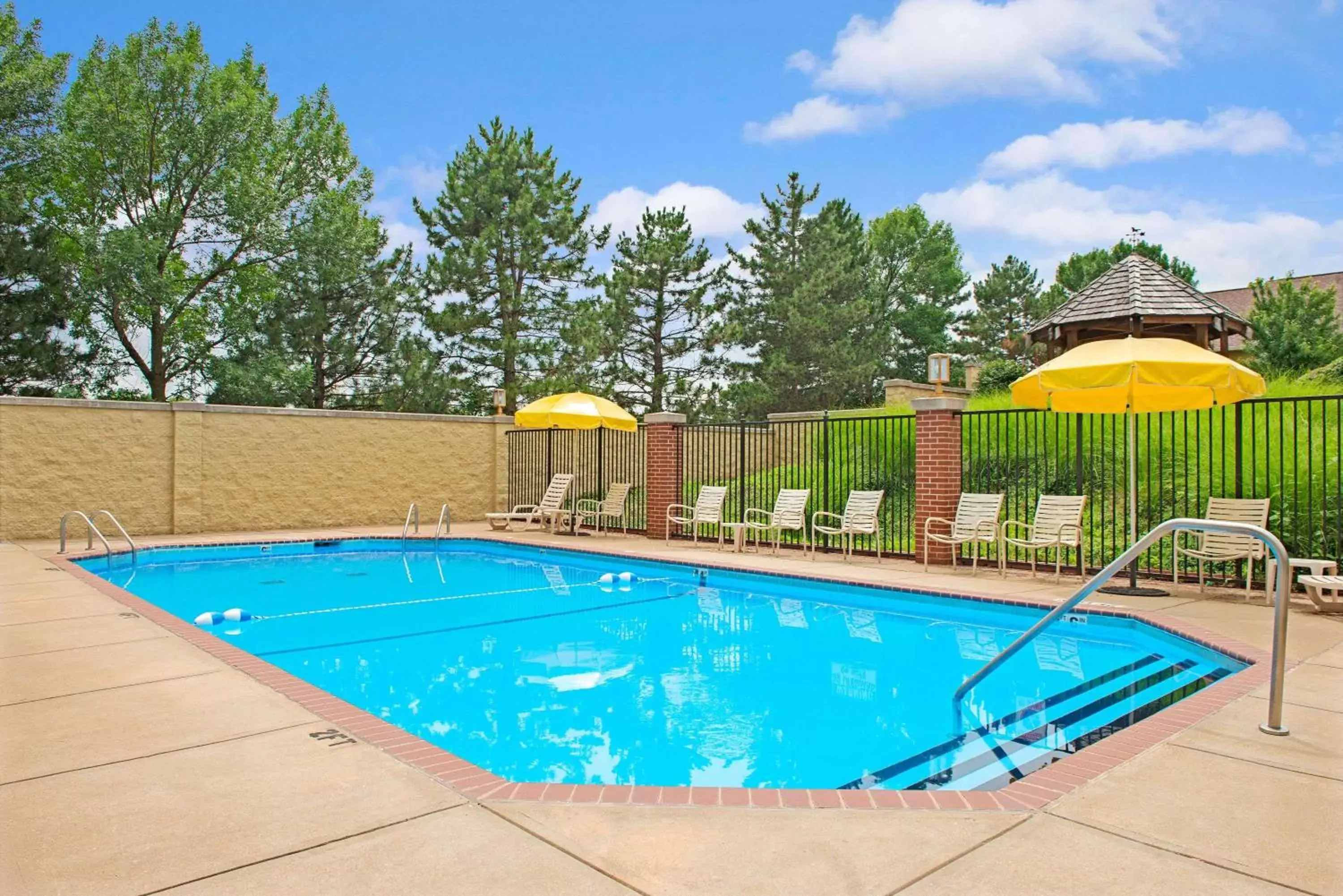 On site, Swimming Pool in Days Inn by Wyndham St. Louis/Westport MO