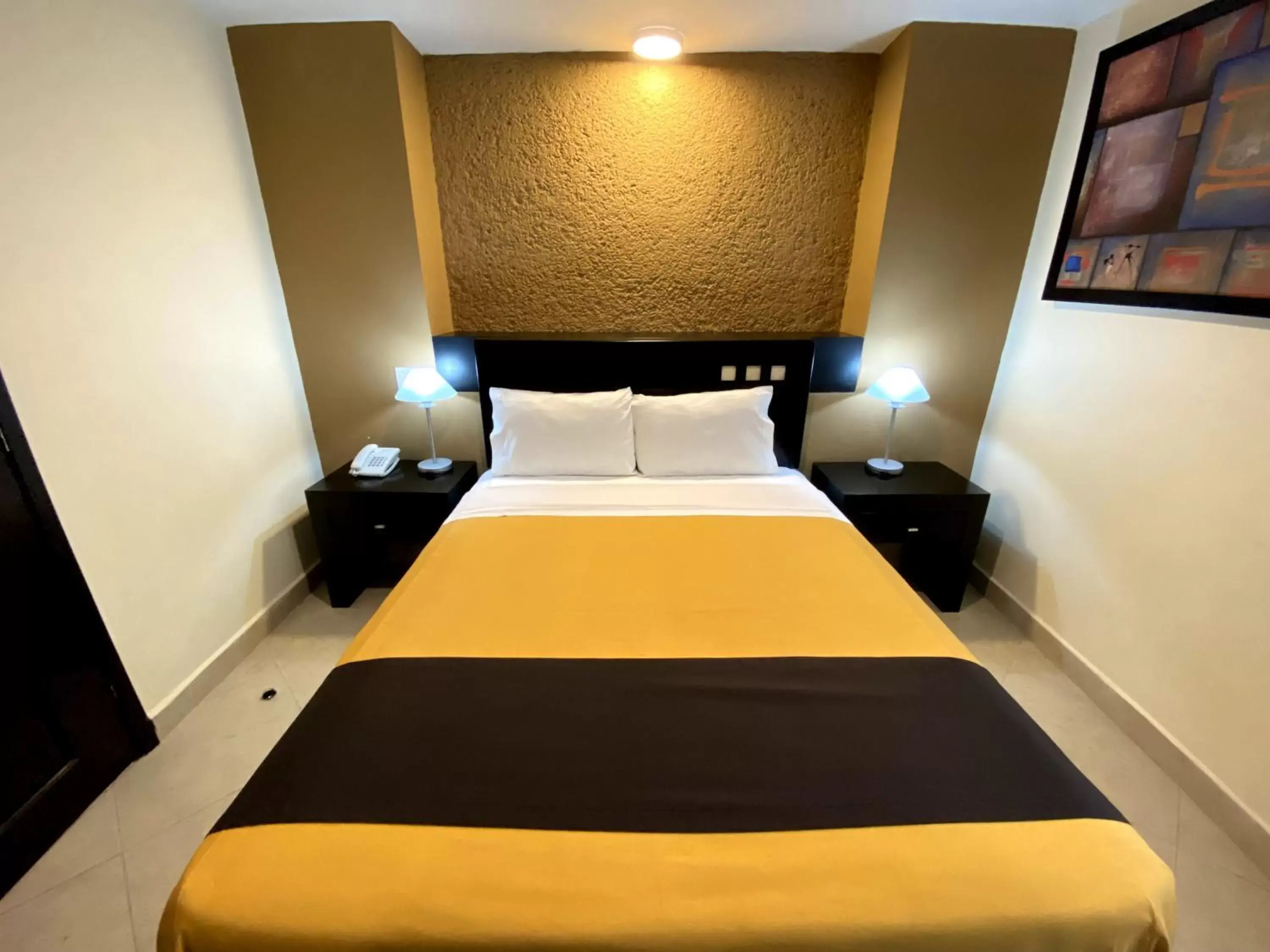 Photo of the whole room, Bed in Hotel Escala Puebla Centro Photo of the whole room, Bed in Hotel Escala Puebla Centro