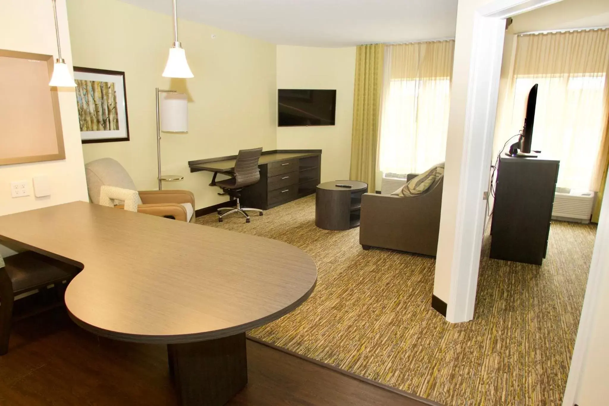 Bedroom, Seating Area in Candlewood Suites - Dumfries - Quantico, an IHG Hotel