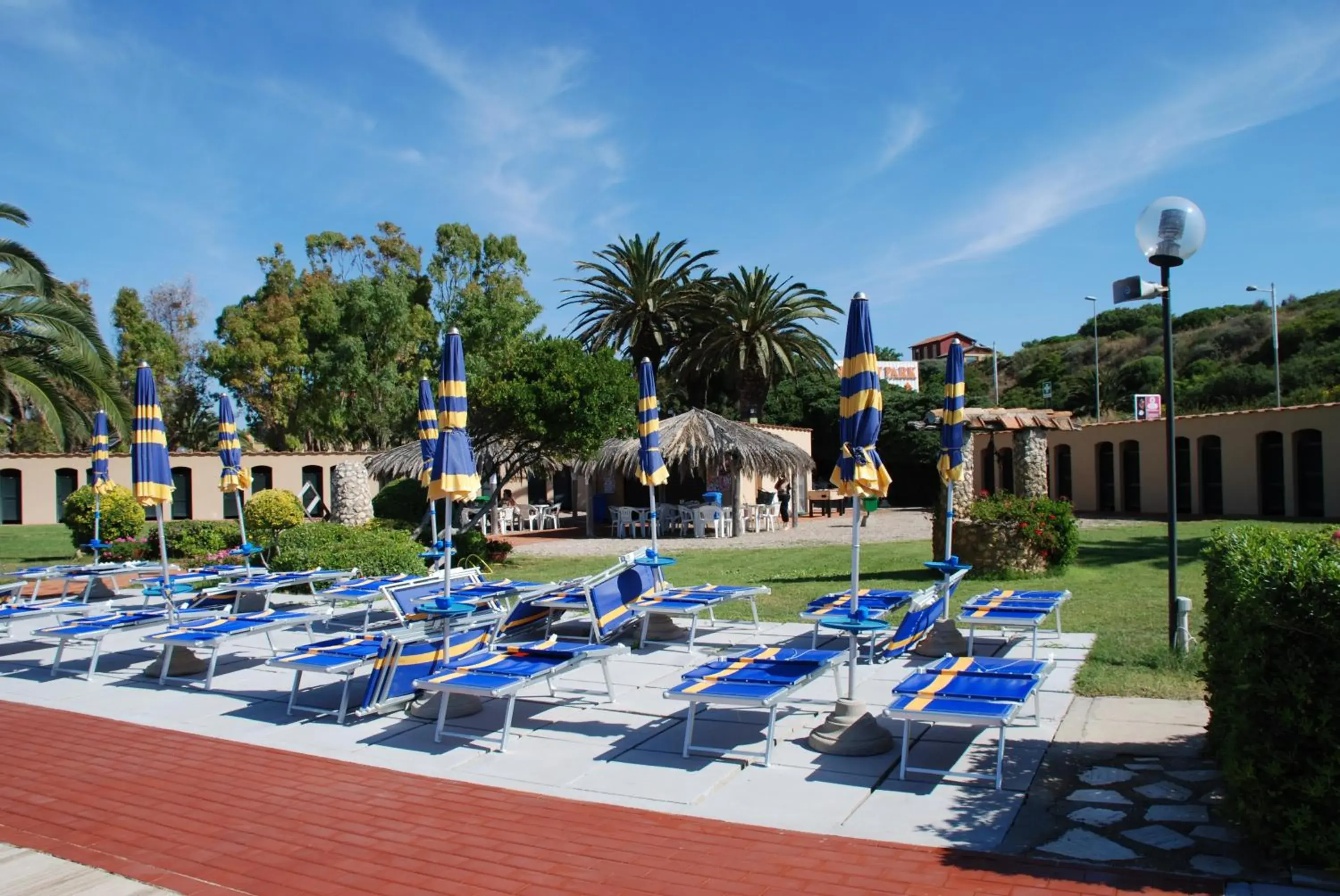 Patio, Swimming Pool in Hotel Baia Del Sole