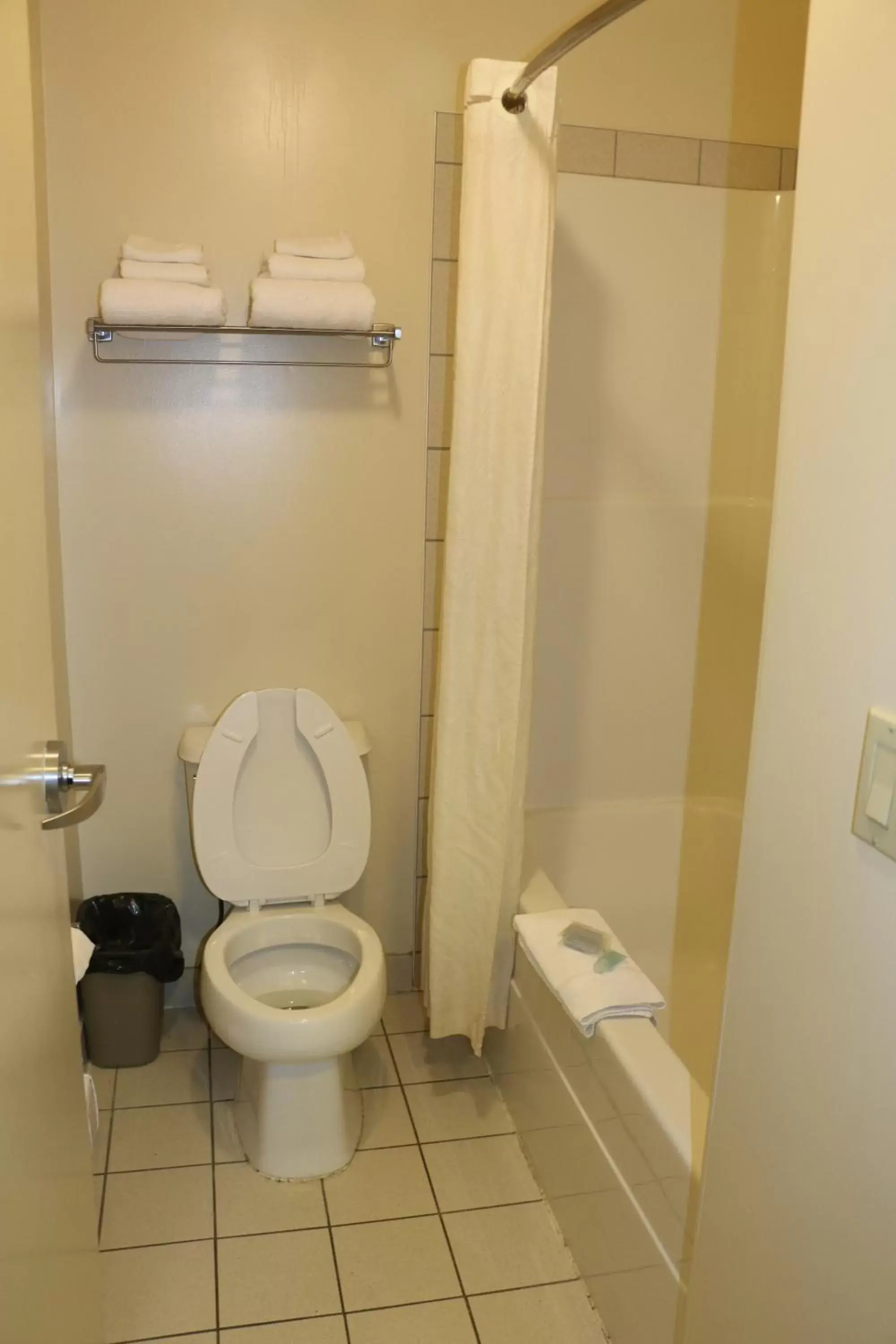 Toilet, Bathroom in Empire Inn & Suites