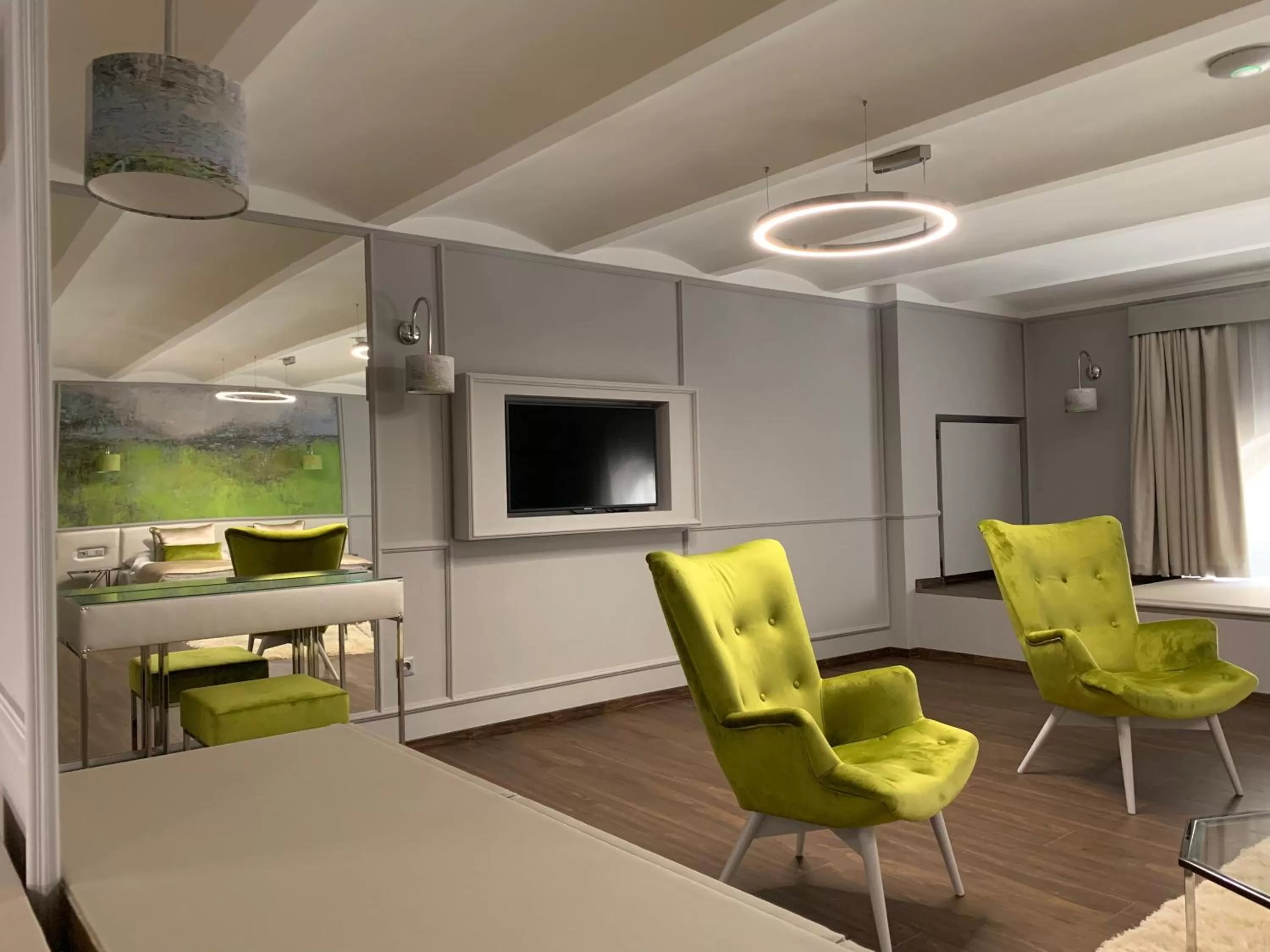 Communal lounge/ TV room, Seating Area in Boutique Hotel Center