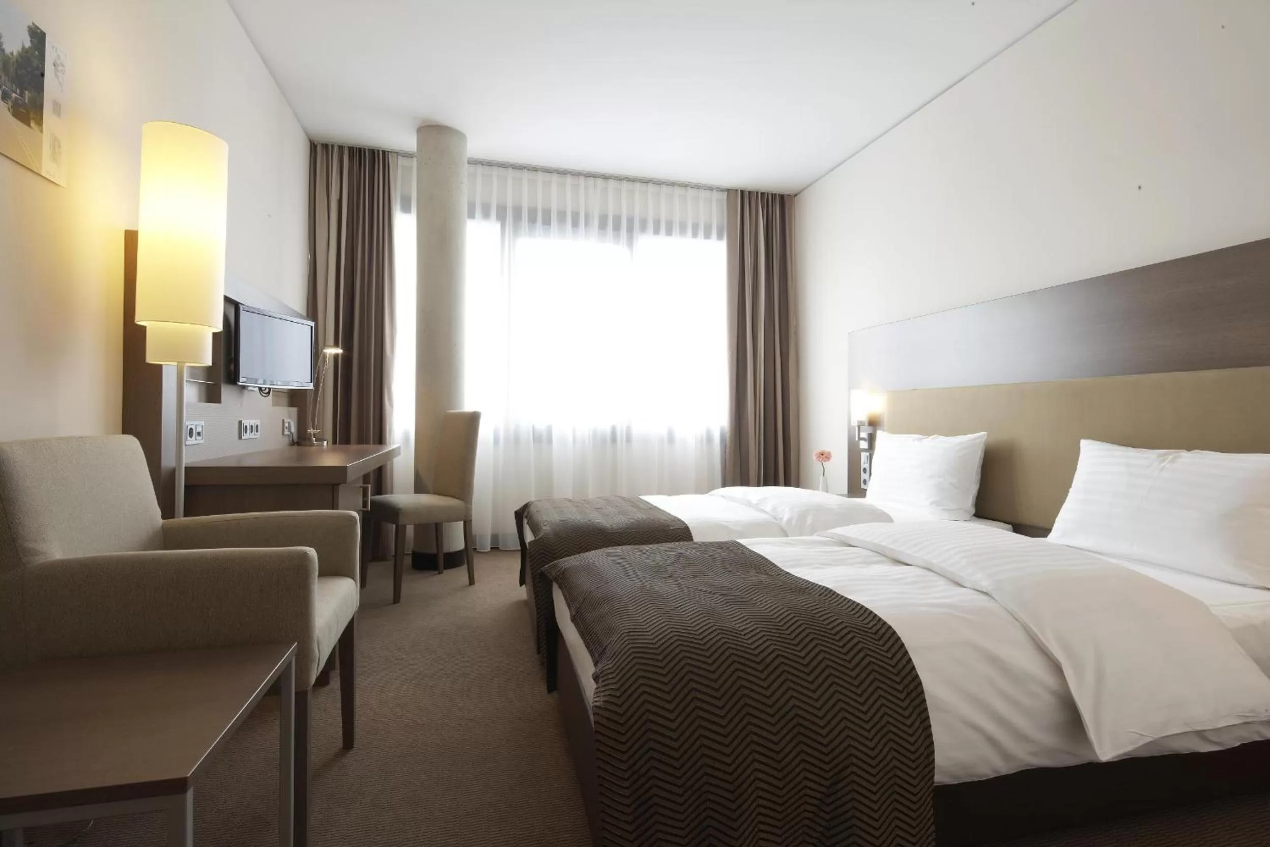 Photo of the whole room, Bed in IntercityHotel Mannheim