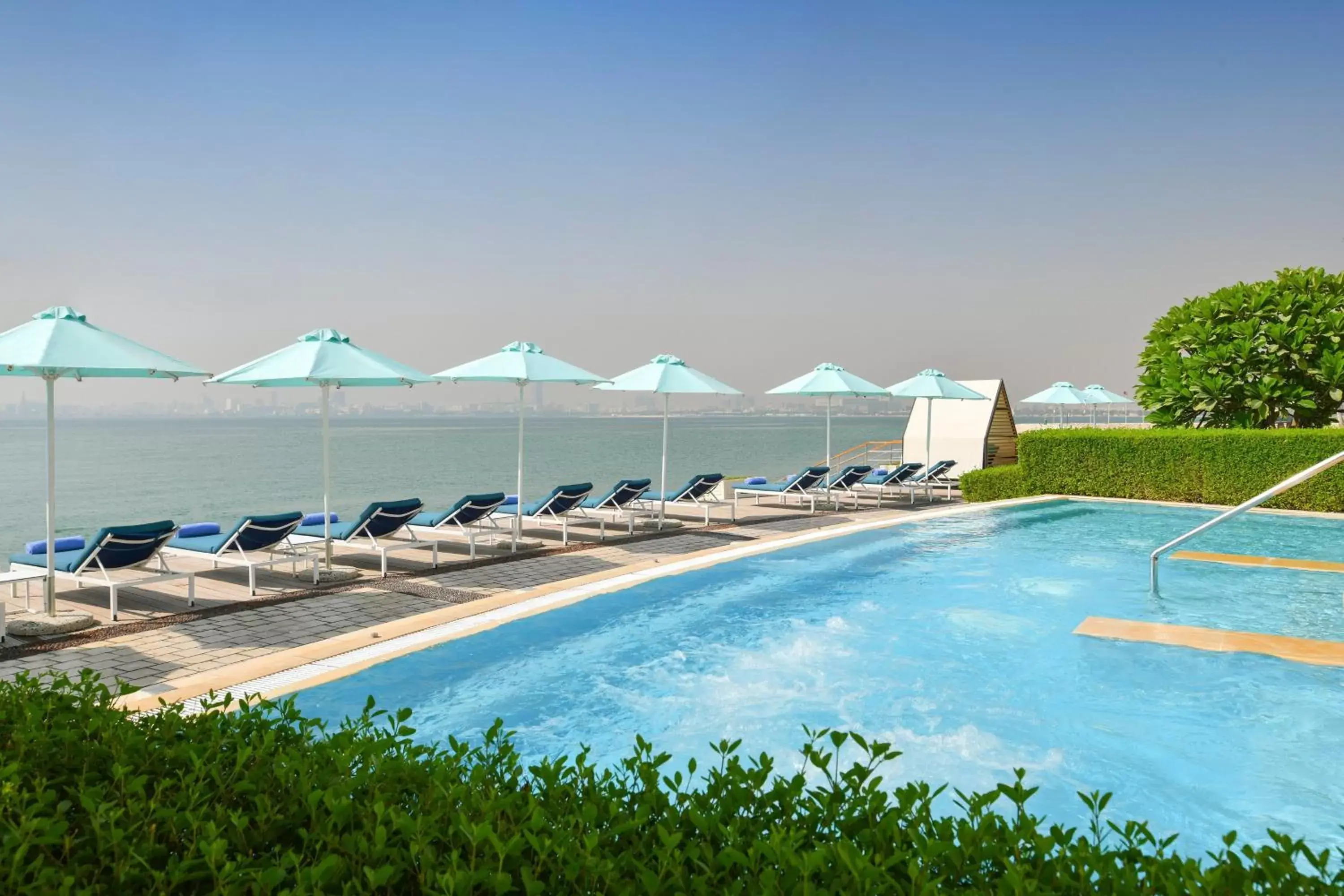Fitness centre/facilities, Swimming Pool in Sheraton Grand Doha Resort & Convention Hotel