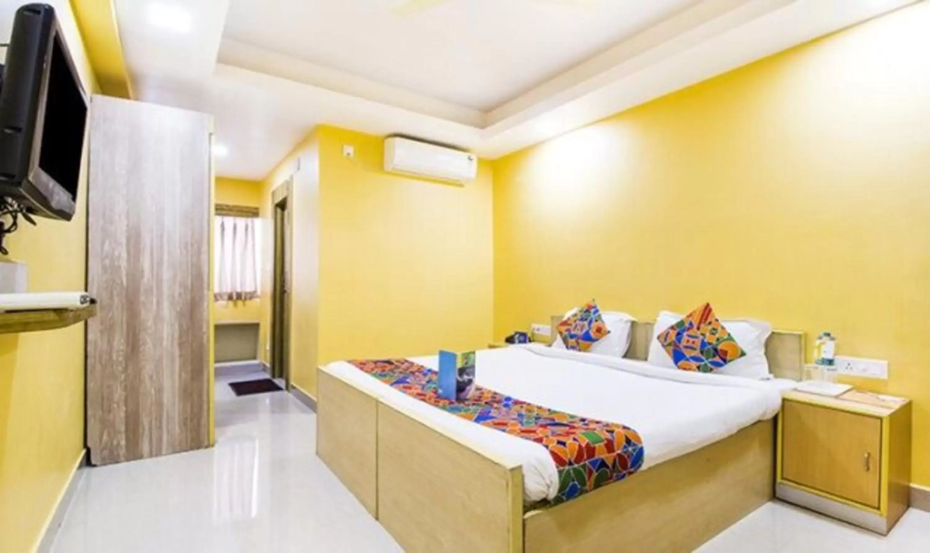View (from property/room), Bed in FabHotel Amaltas