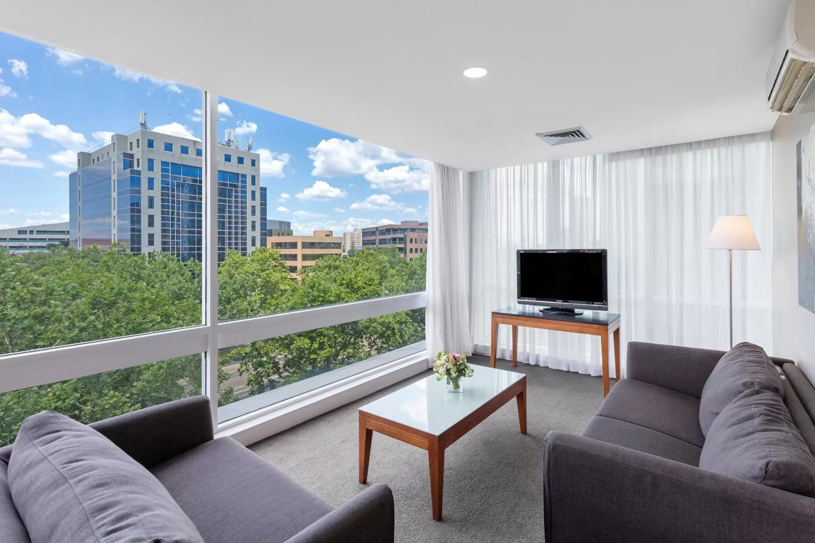 Living room, Seating Area in Park Regis Griffin Suites