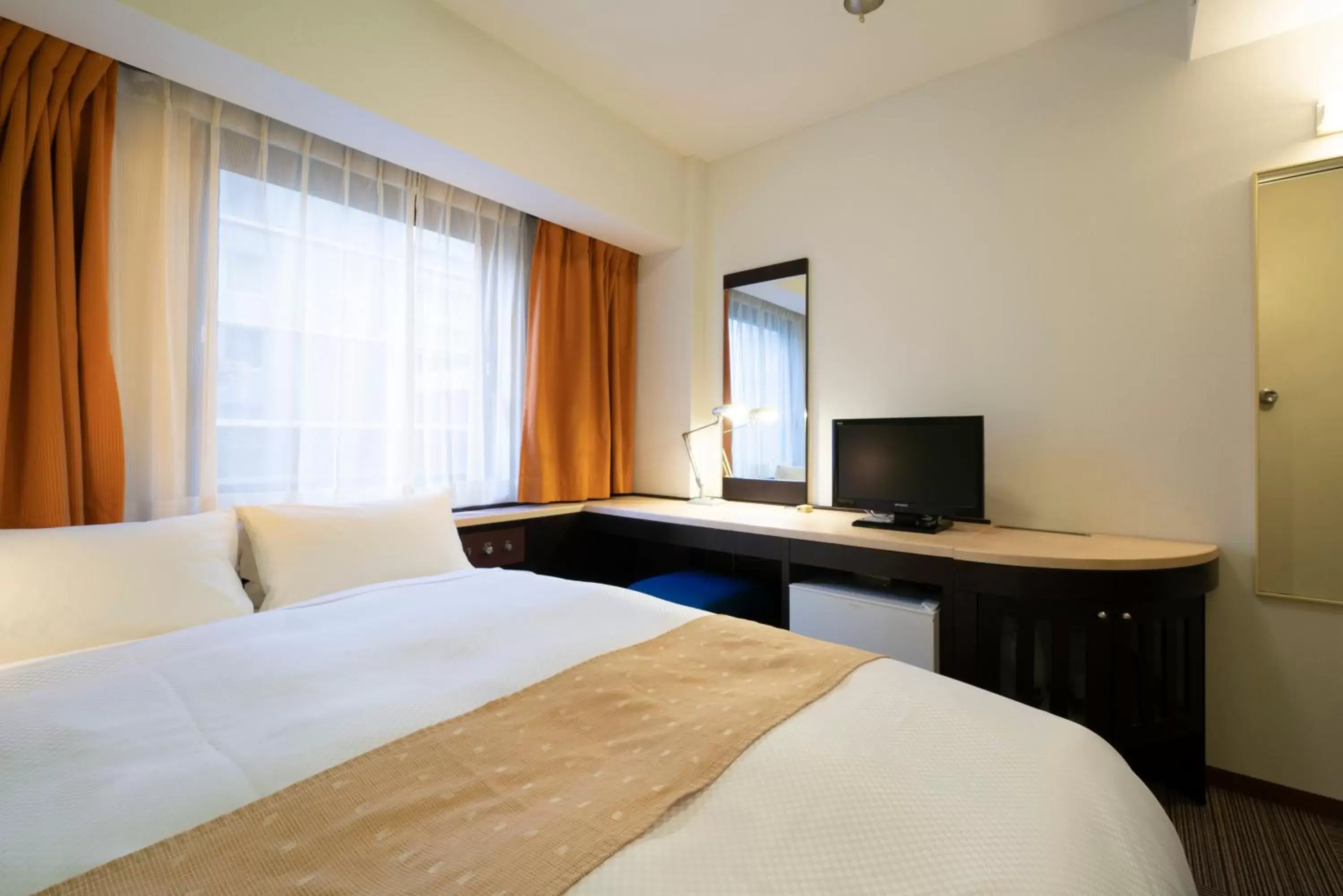 Communal lounge/ TV room, Bed in Hotel S-plus Nagoya Sakae