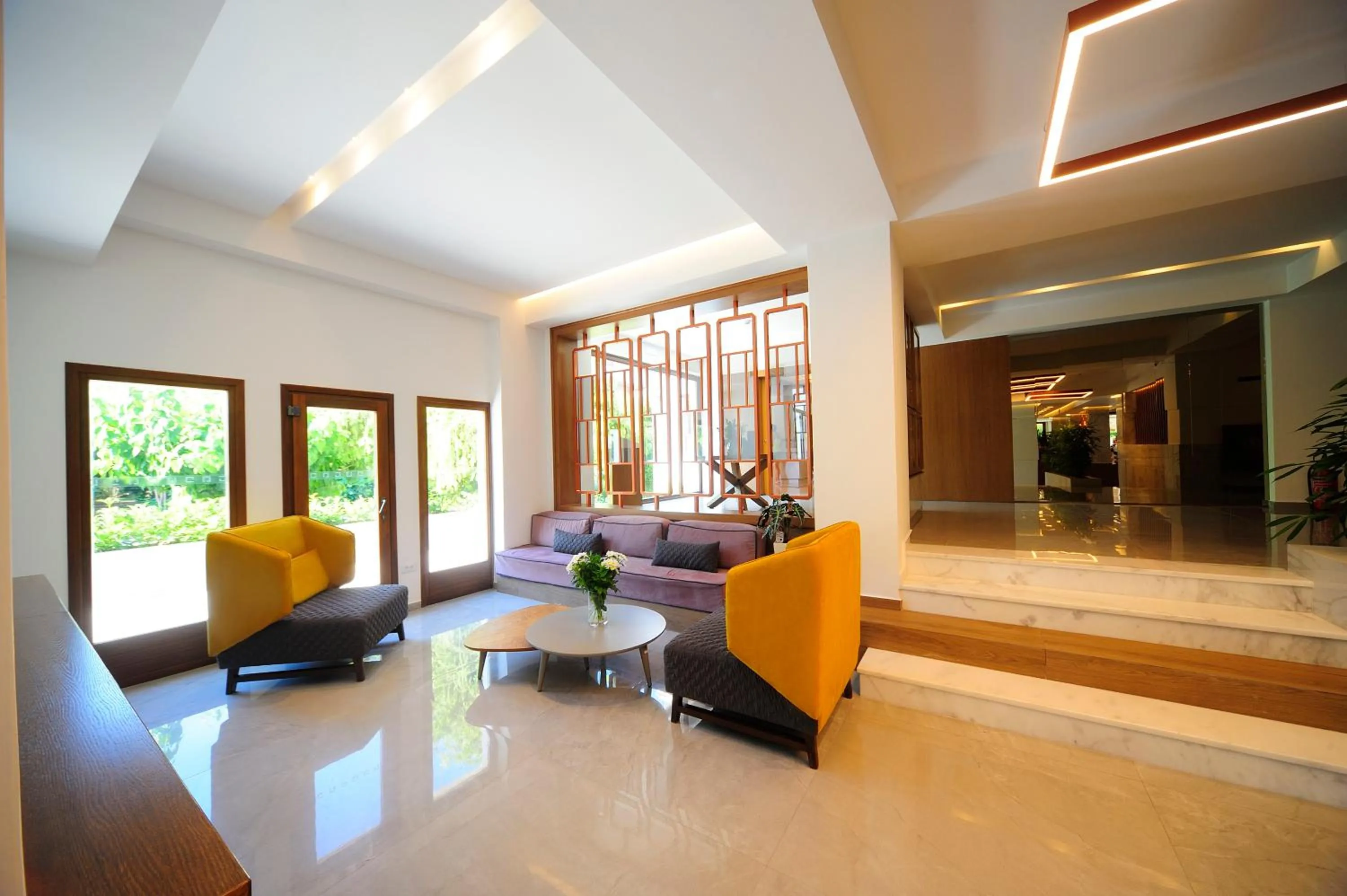 Seating area in Atrium Ambiance Hotel