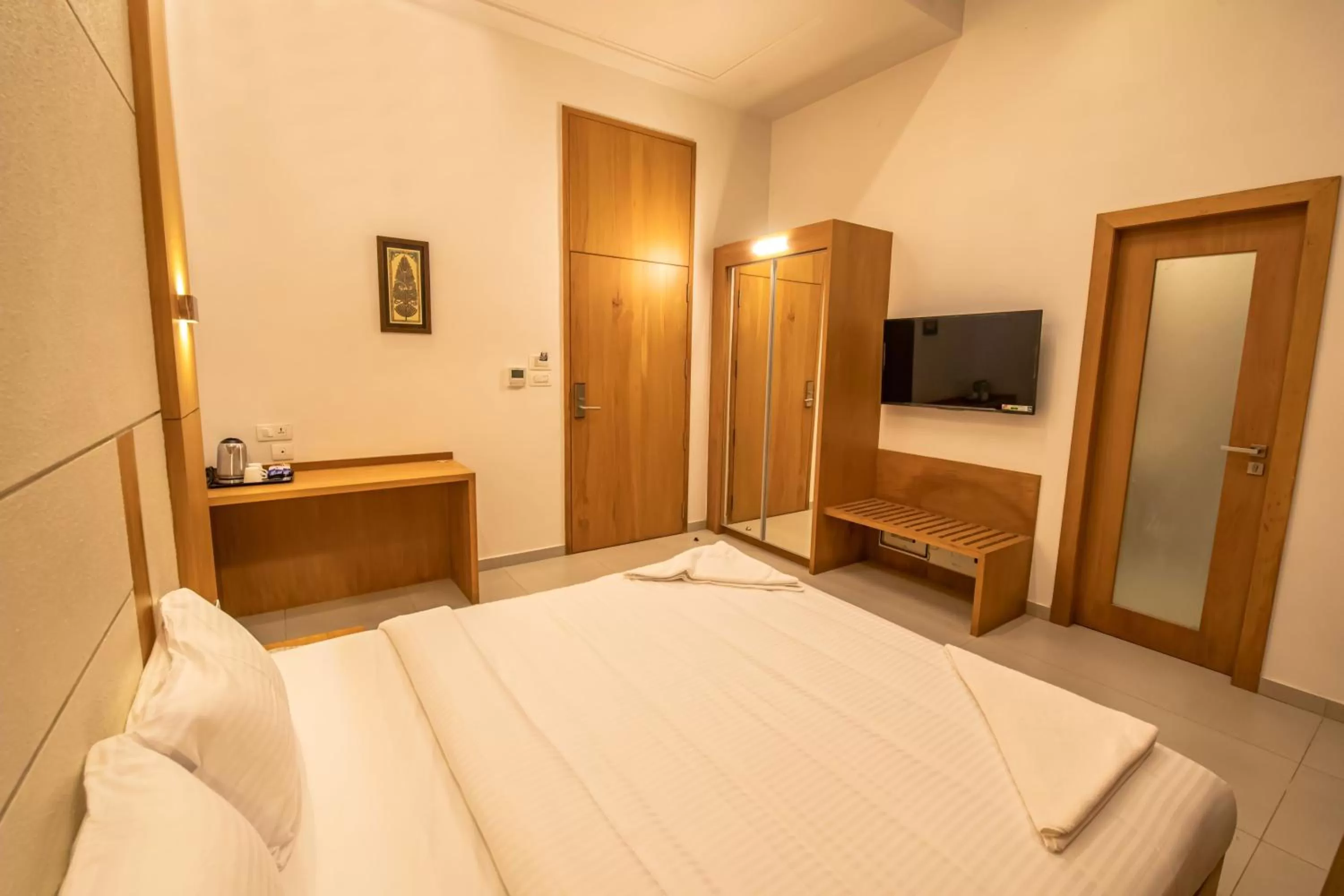 Photo of the whole room, Bed in RATHNA RESIDENCY - Near US CONSULATE