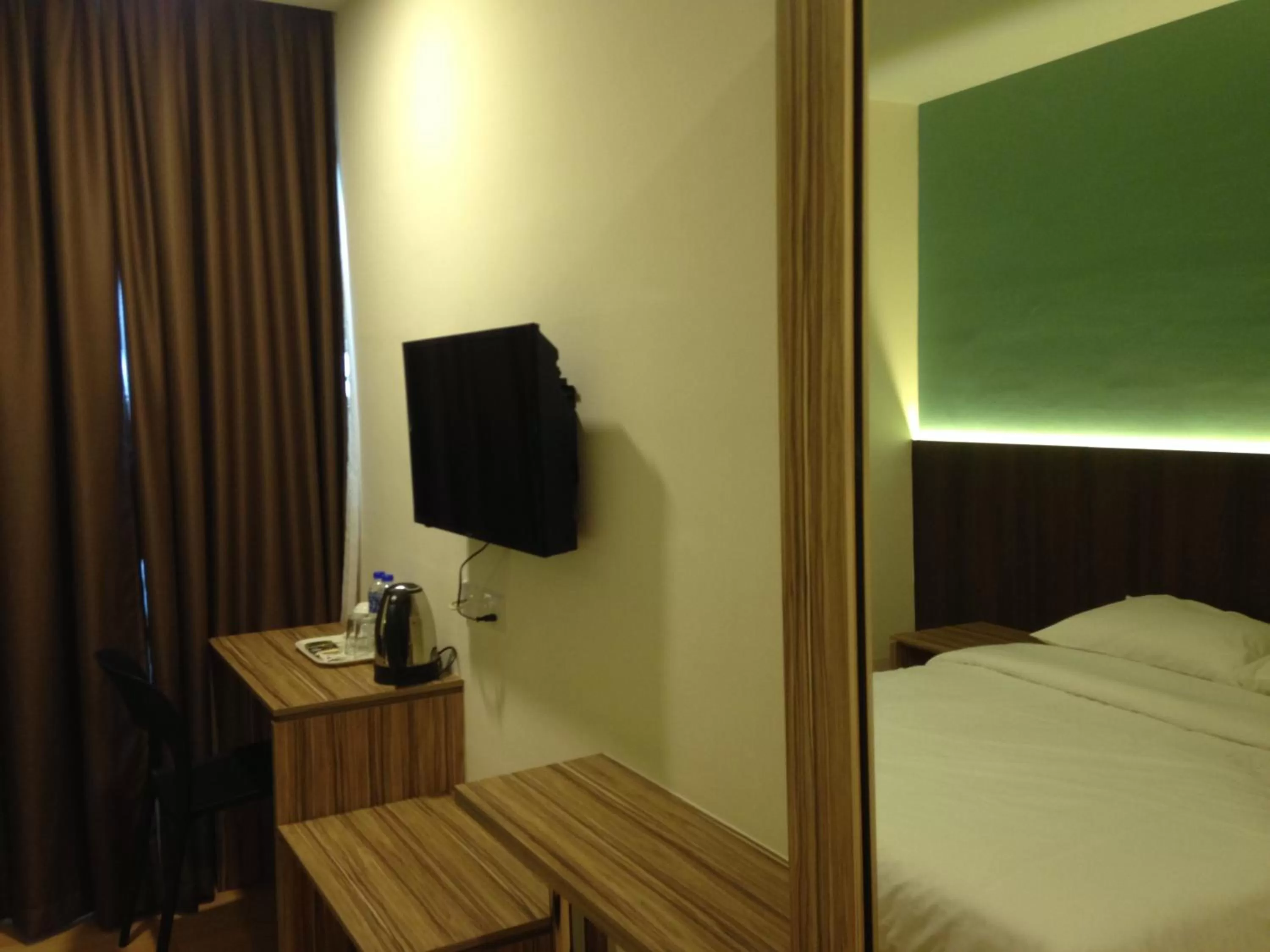 Bed in Tumike Hotel Bentong