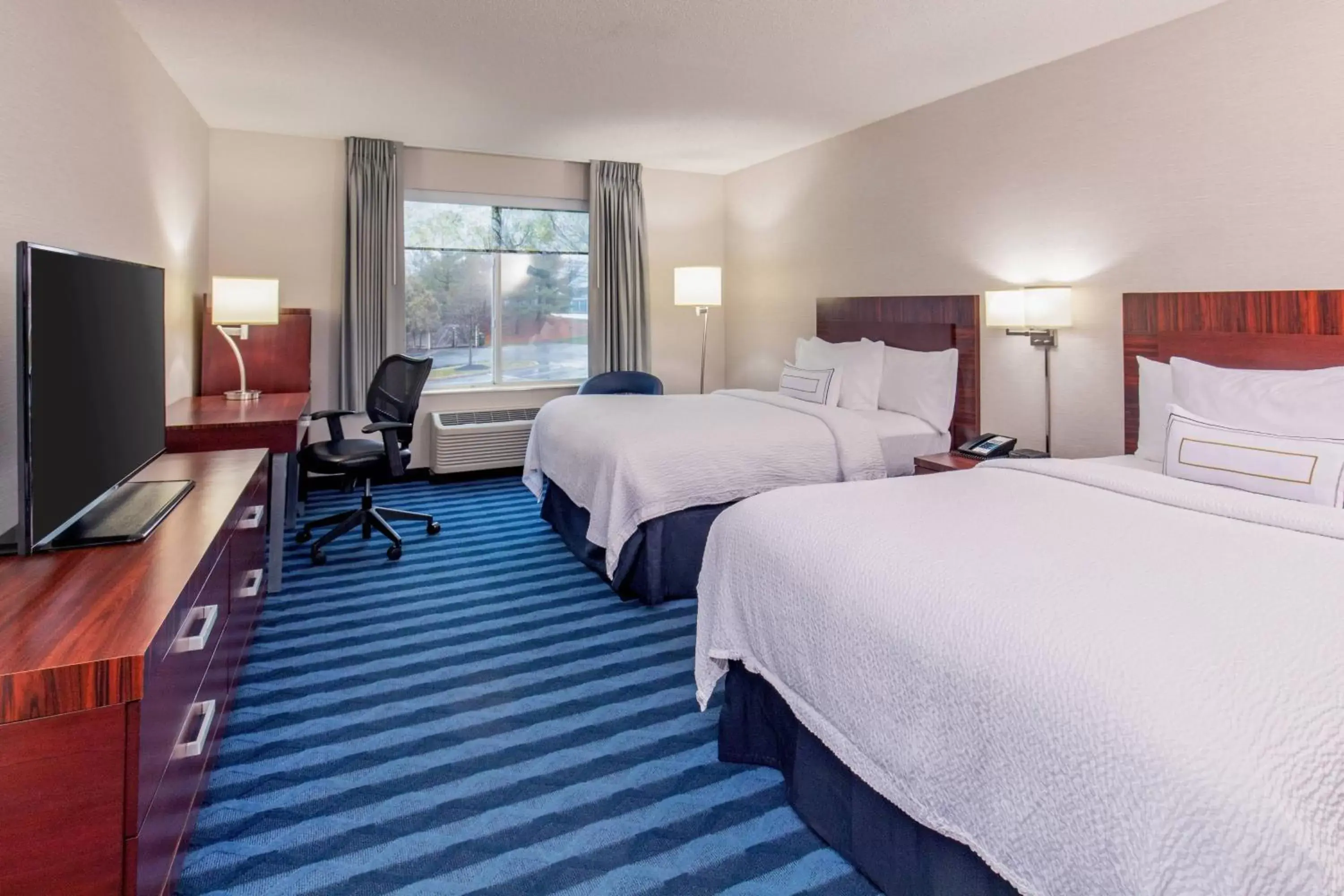 Photo of the whole room, TV/Entertainment Center in Fairfield Inn & Suites Lancaster