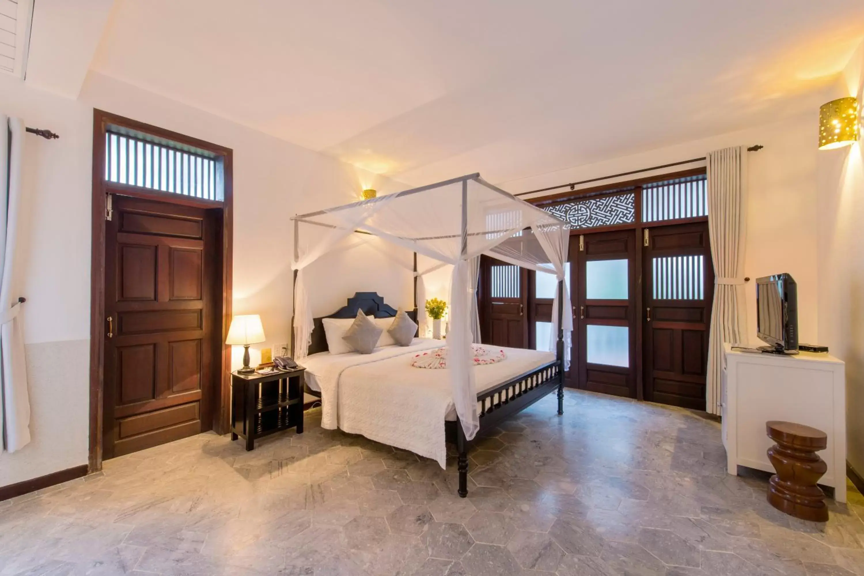 Bed in Hoi An Ancient House Resort & Spa