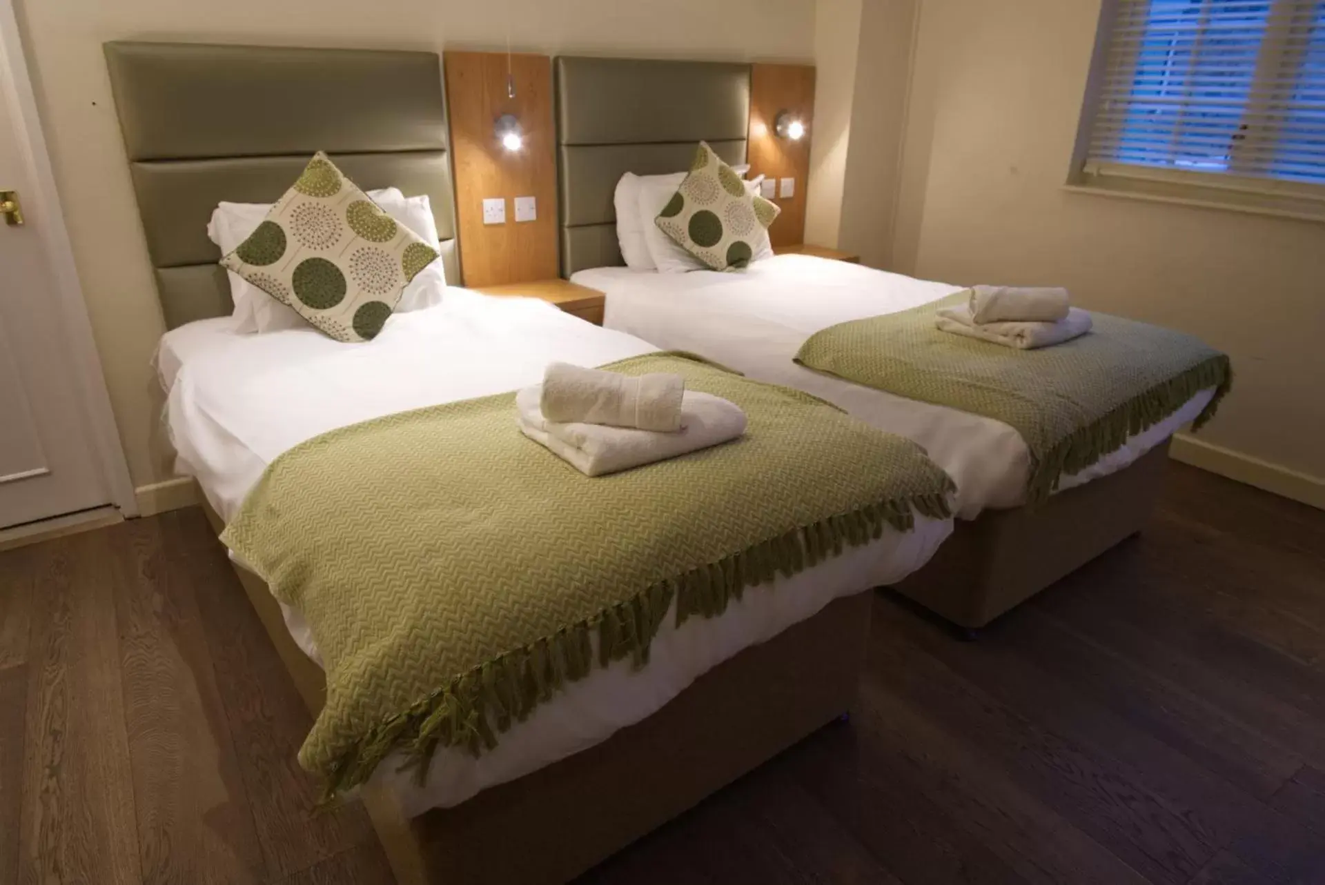 Bed in New Inn Hotel
