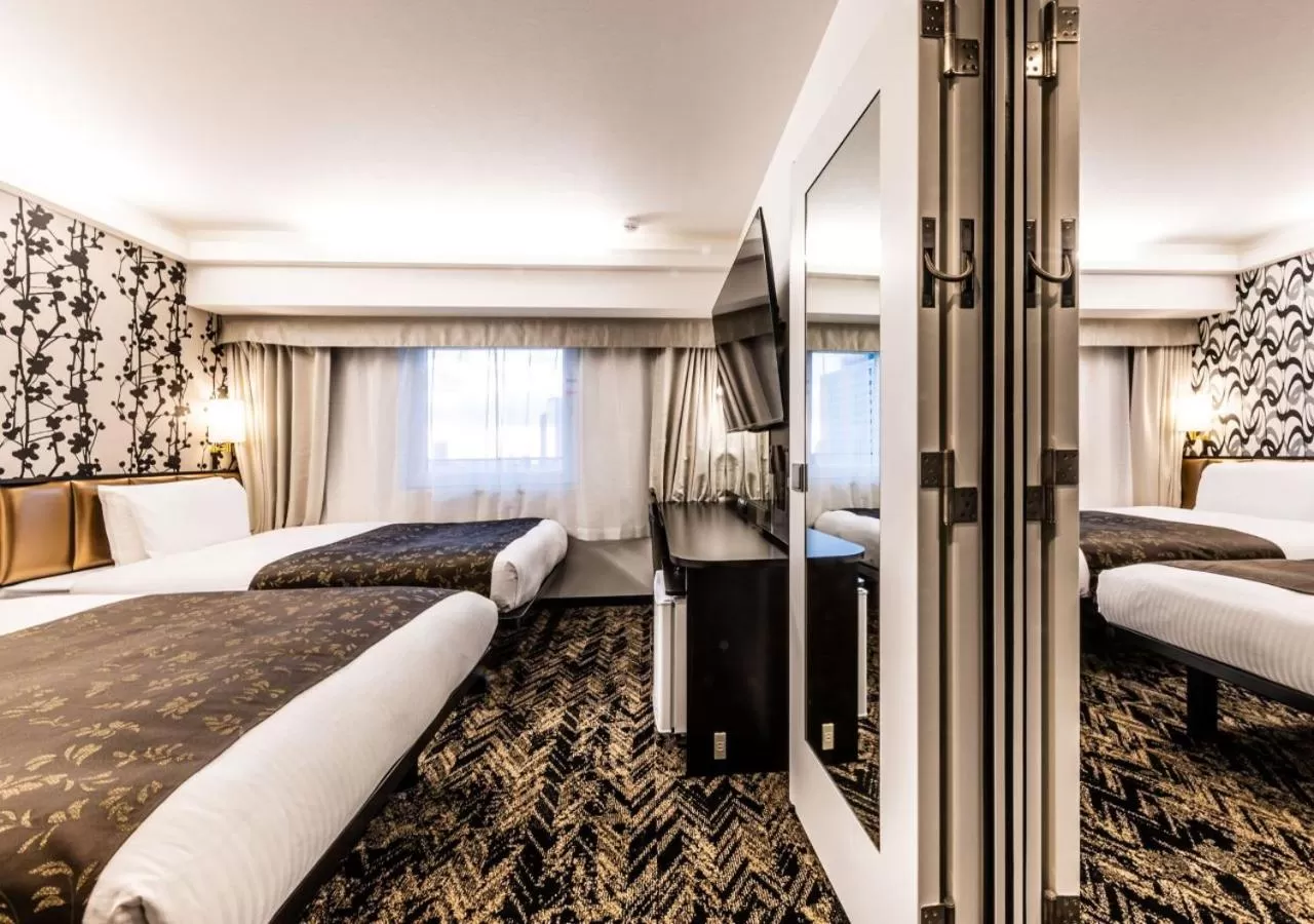 Photo of the whole room, Bed in APA Hotel & Resort Osaka Umeda Eki Tower