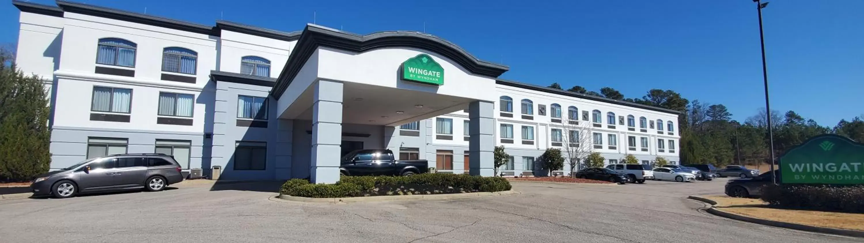 Property building in Wingate by Wyndham Tupelo Property building in Wingate by Wyndham Tupelo