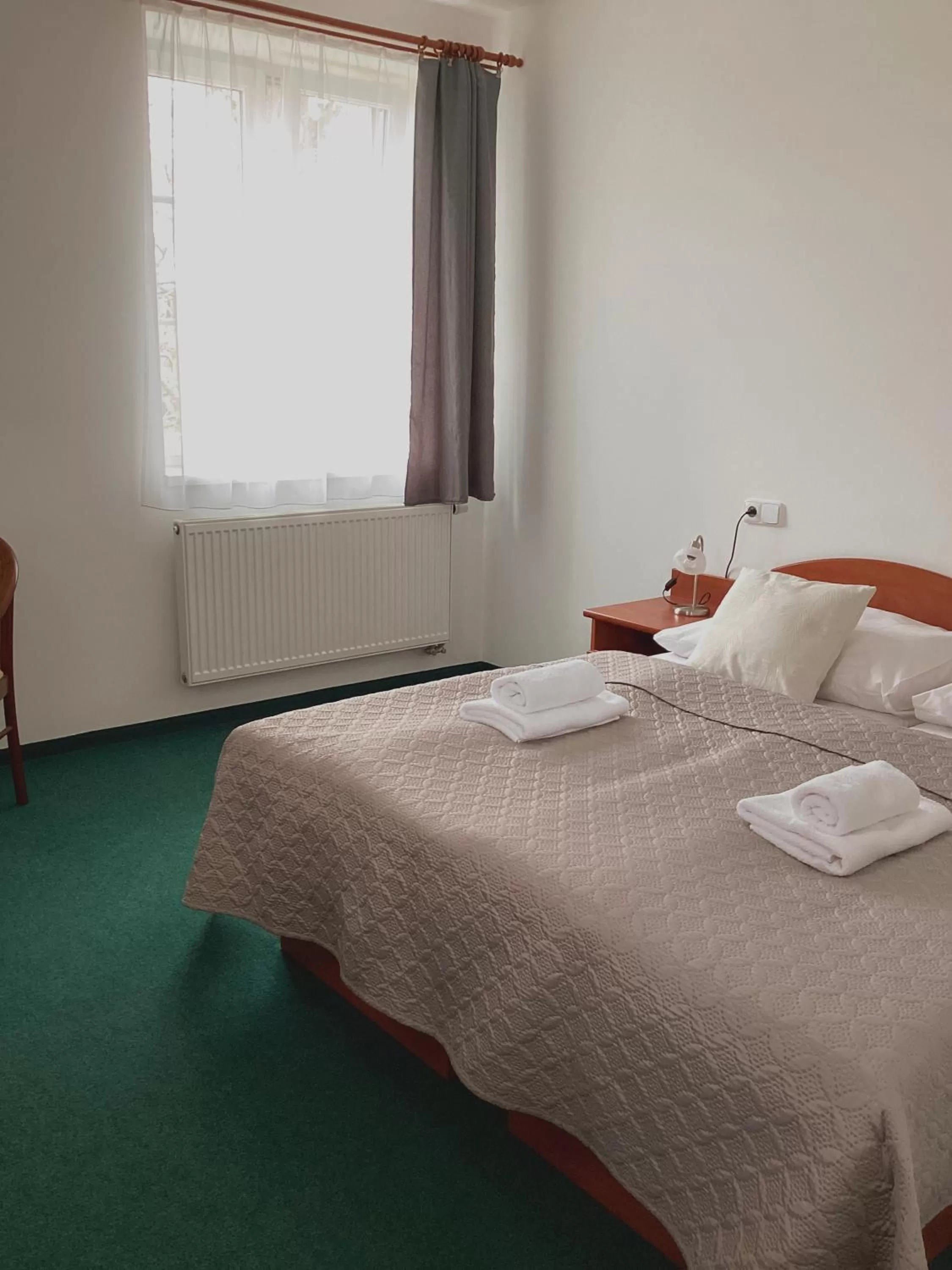 Bed in Hotel Karolina