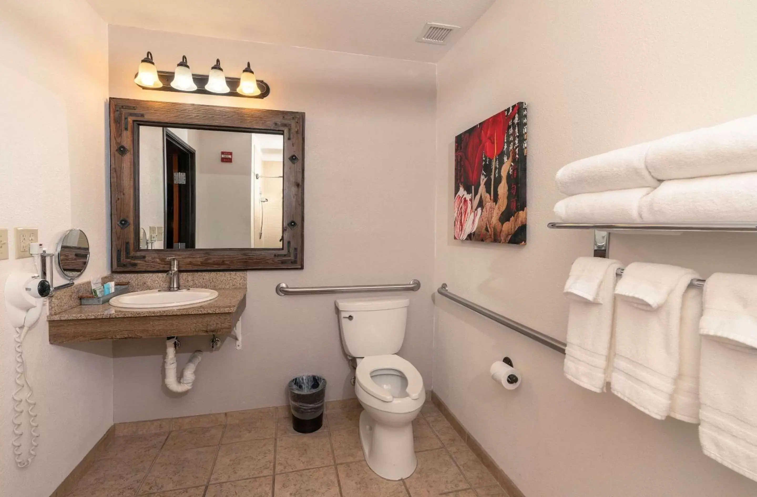 Bathroom in Gold Miners Inn, Ascend Hotel Collection