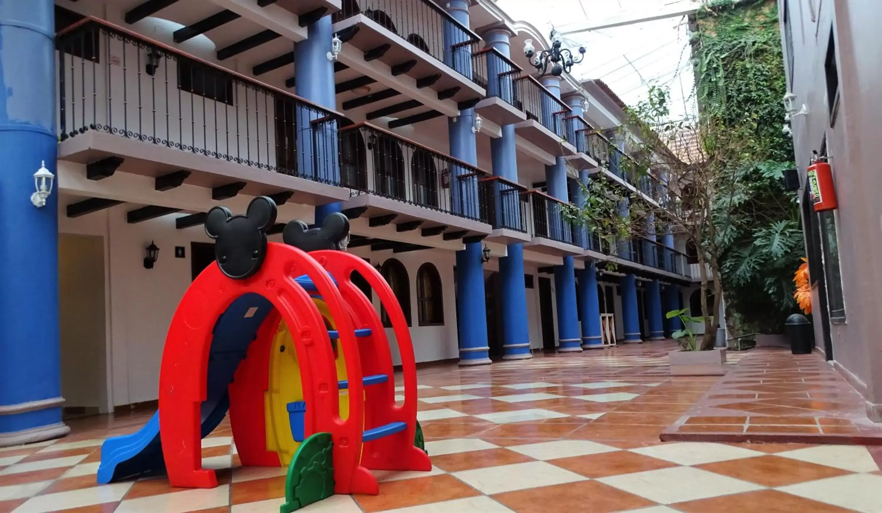 Patio, Children's Play Area in Hotel Jardines Del Carmen