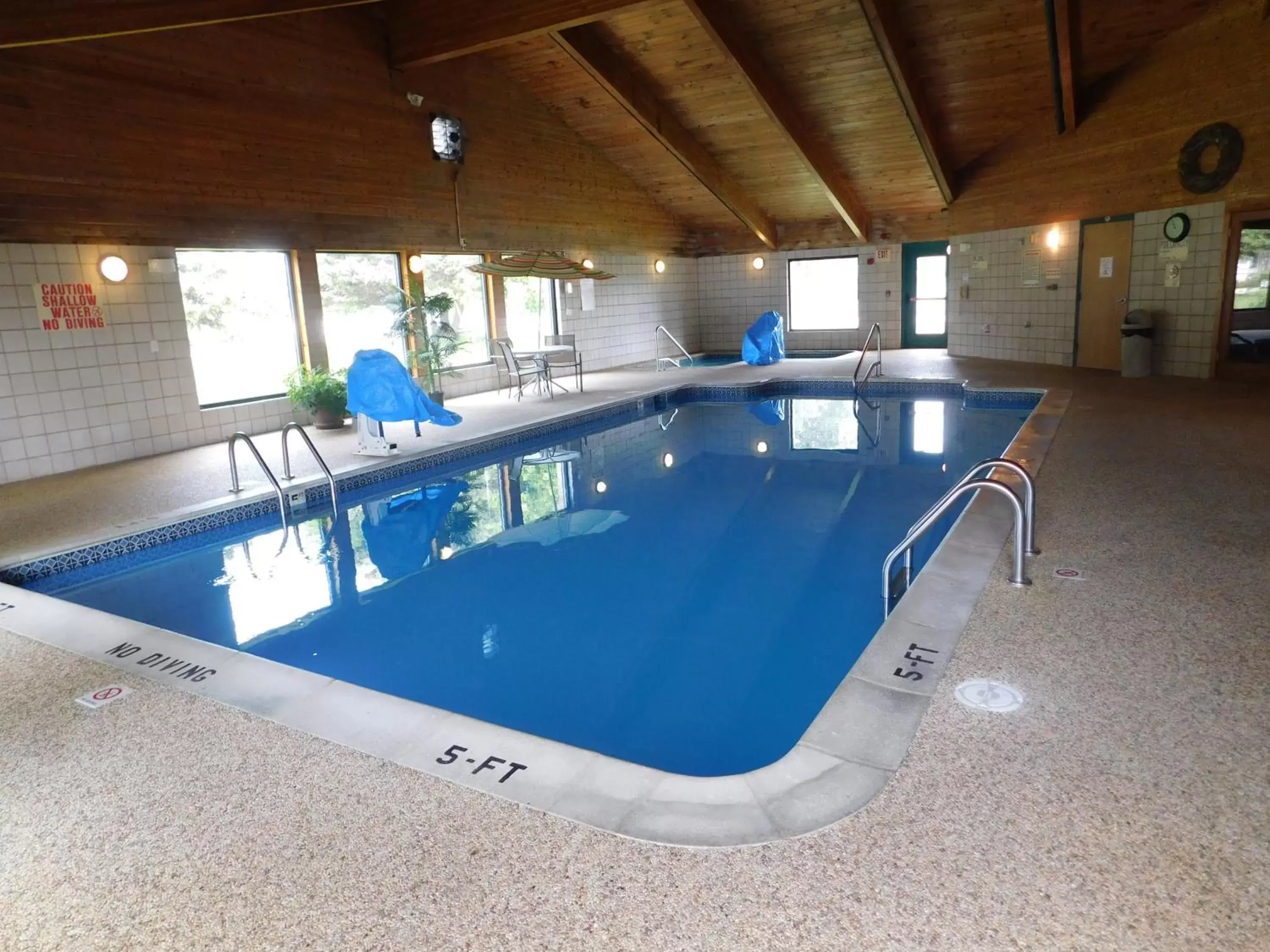 Swimming Pool in AmericInn by Wyndham Oscoda Near AuSable River