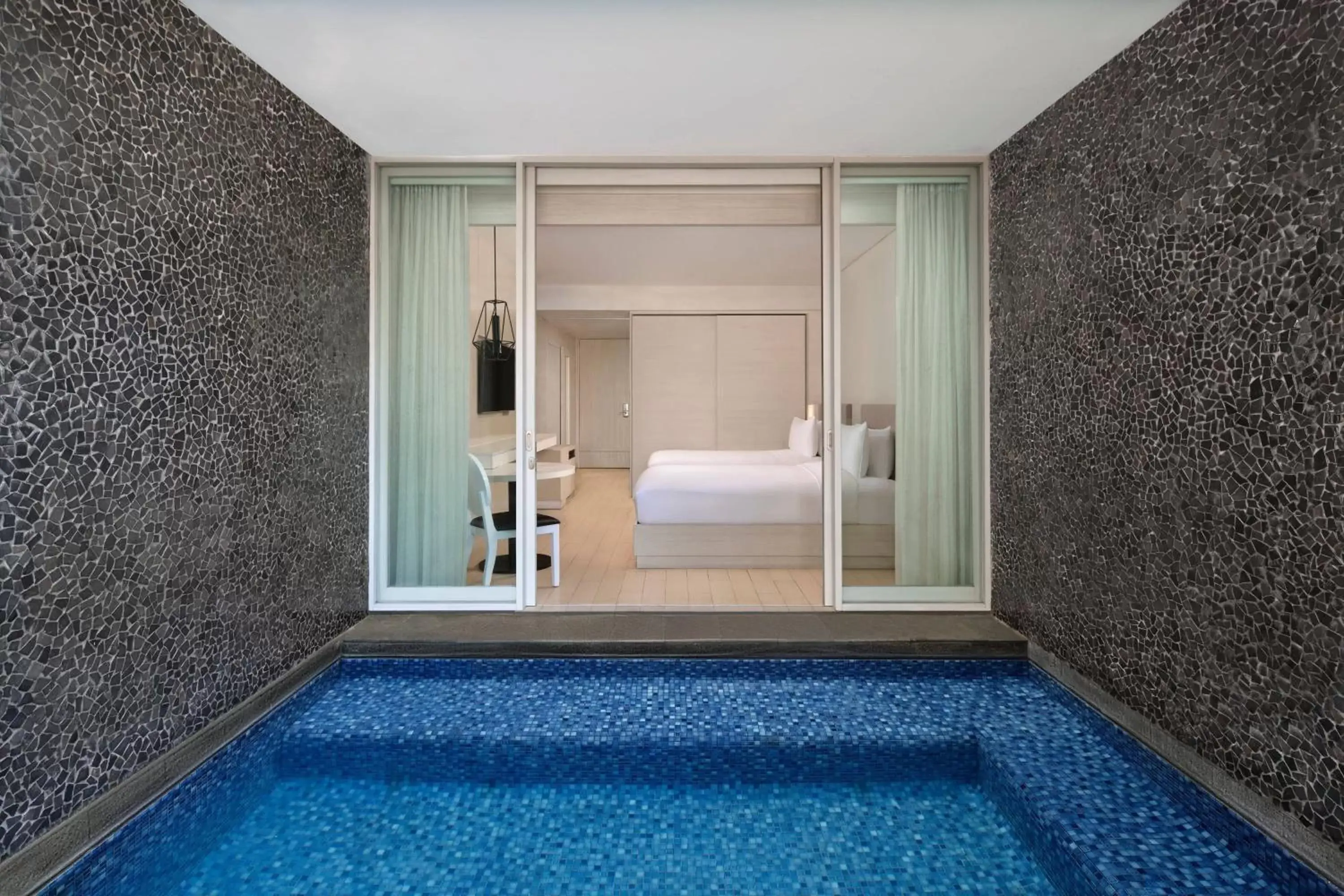 Swimming pool, Bathroom in The Stones - Legian, Bali - A Marriott Autograph Collection Hotel
